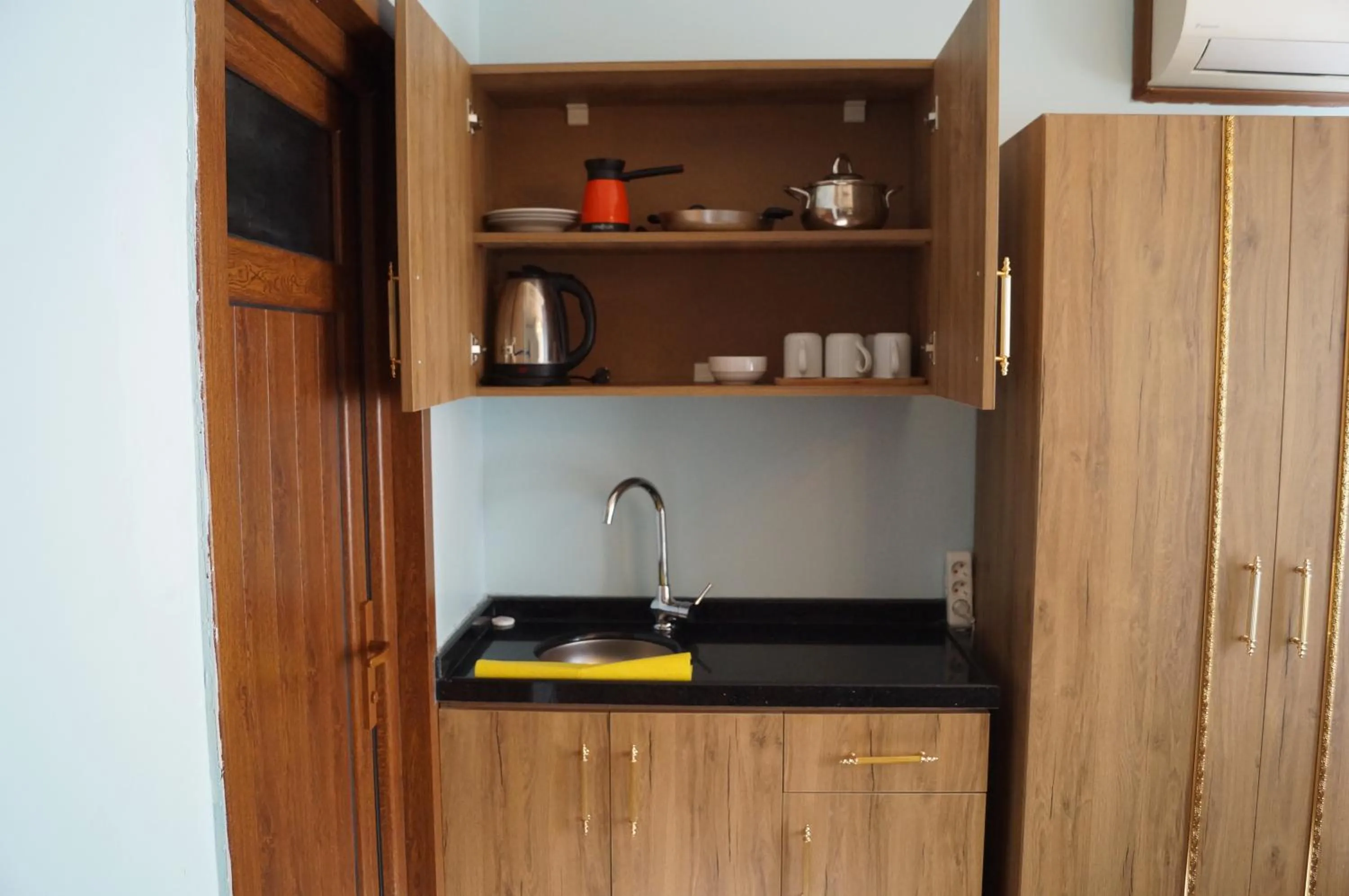 Kitchen or kitchenette in April Story Apart Hotel