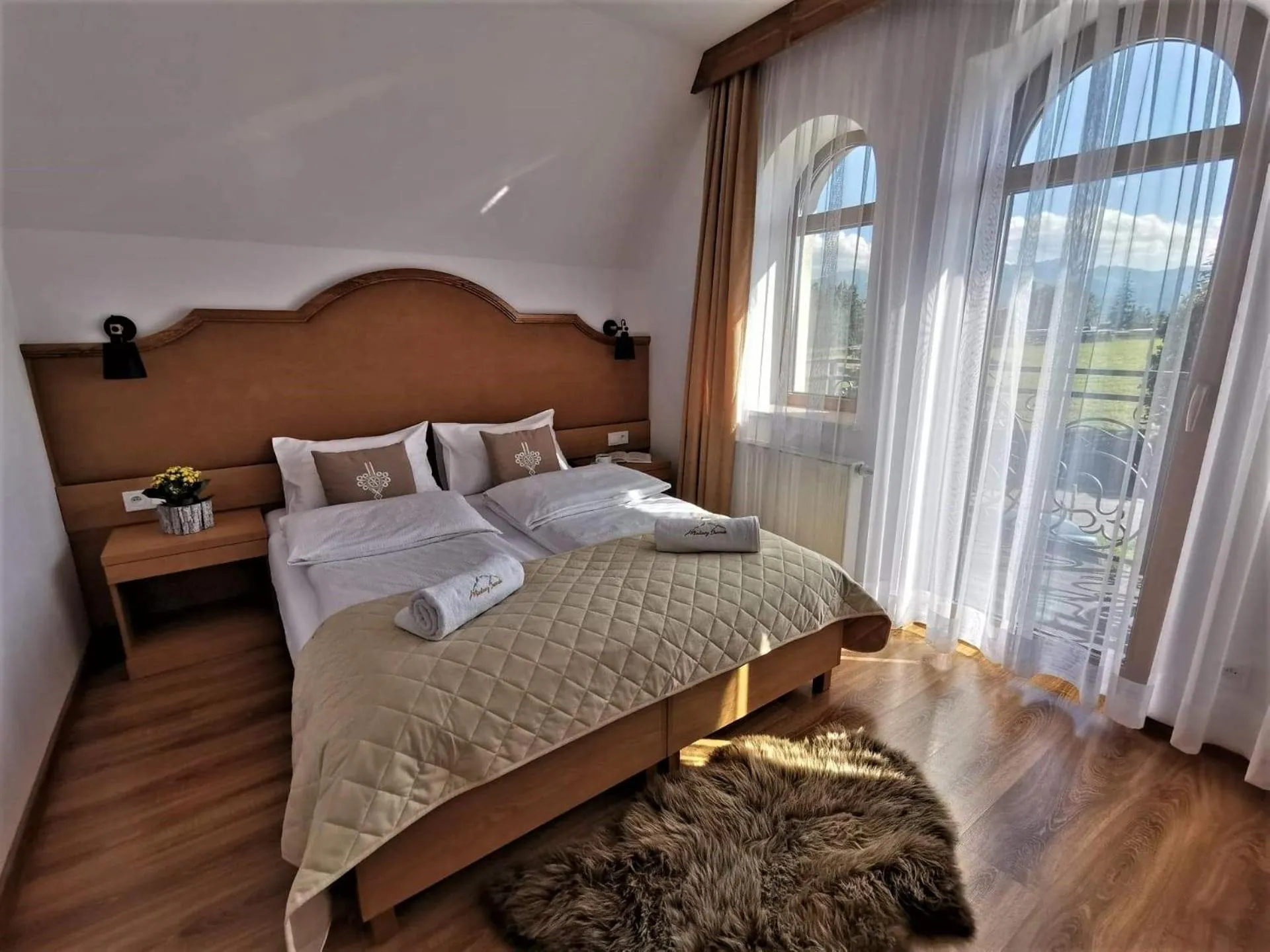 Bed in Miodowy Dworek