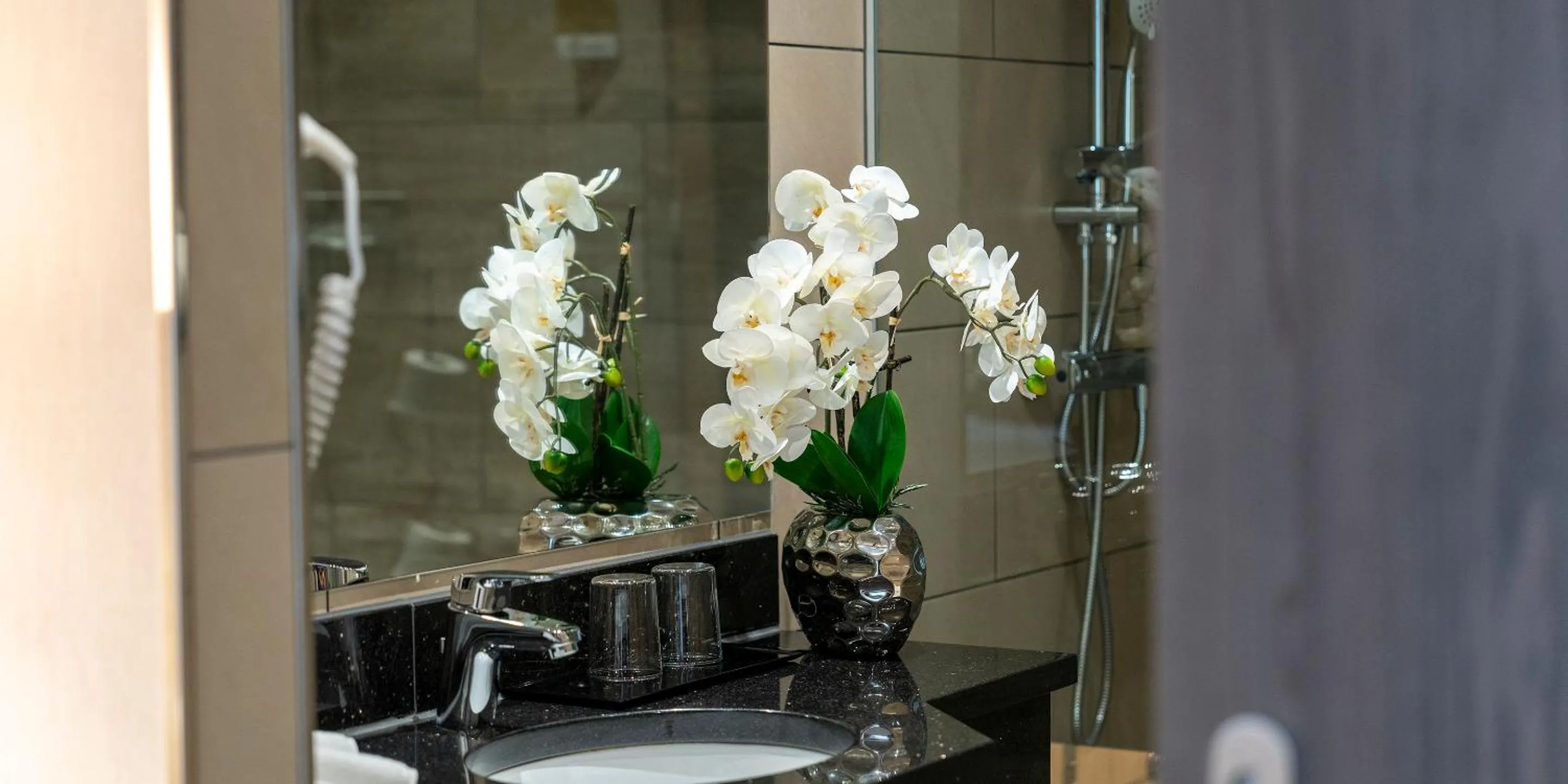 Bathroom in PLAZA INN Rieker Stuttgart Hauptbahnhof