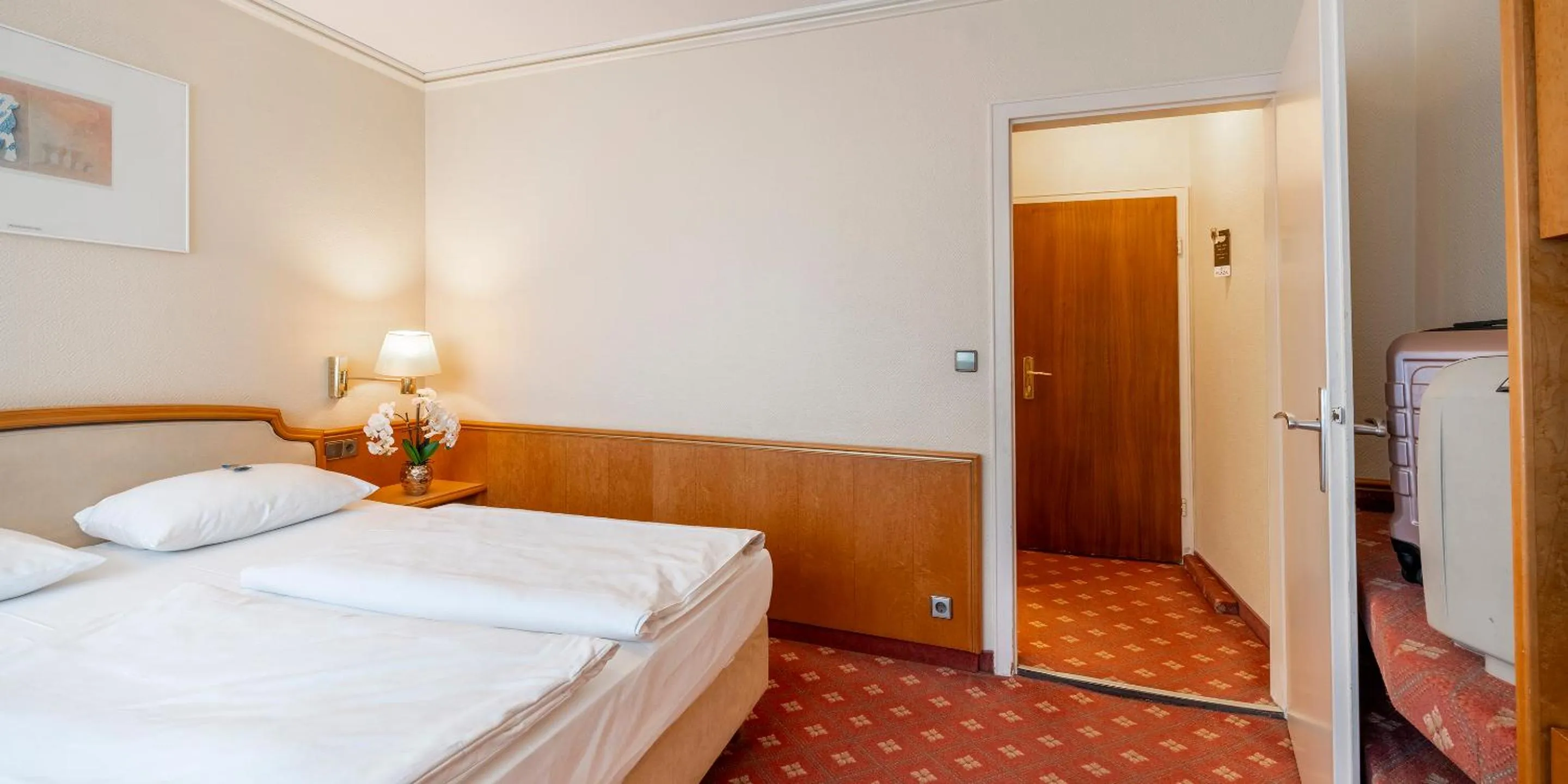 Bed in PLAZA INN Rieker Stuttgart Hauptbahnhof