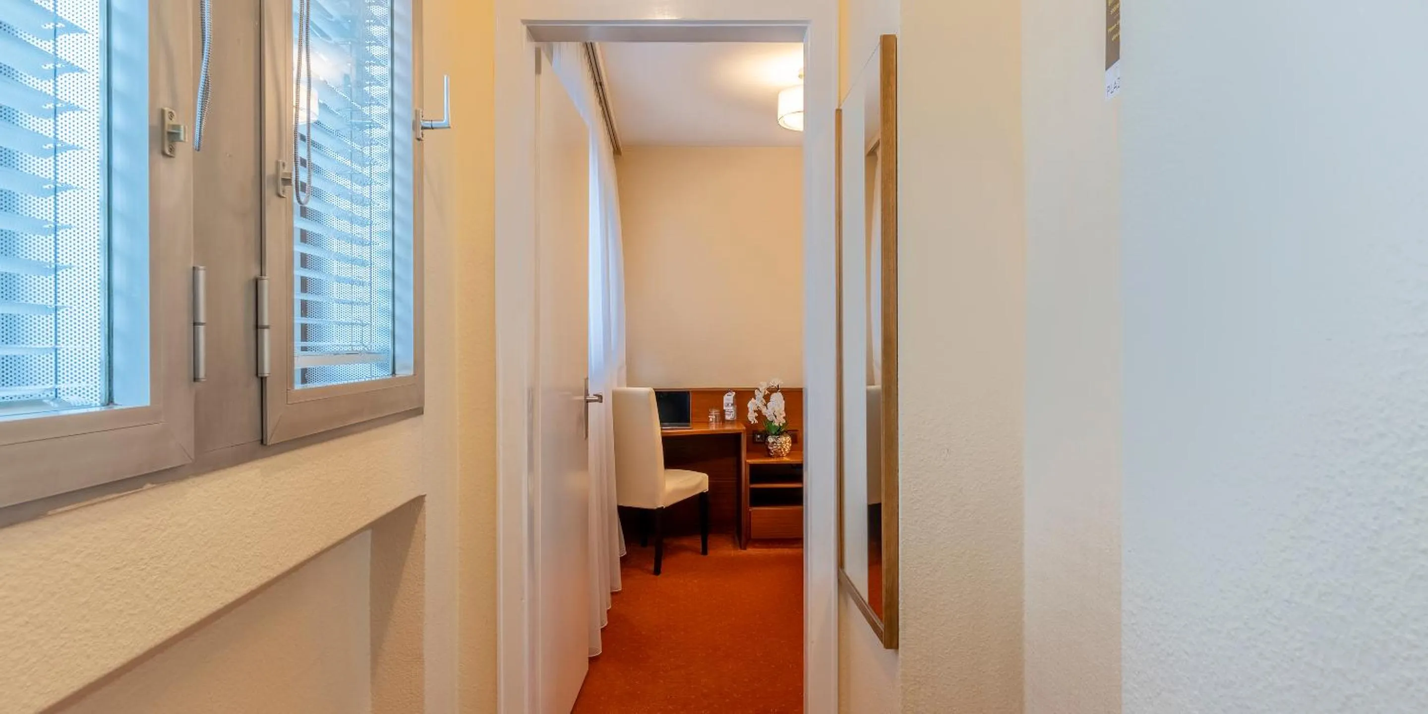 Bedroom in PLAZA INN Rieker Stuttgart Hauptbahnhof