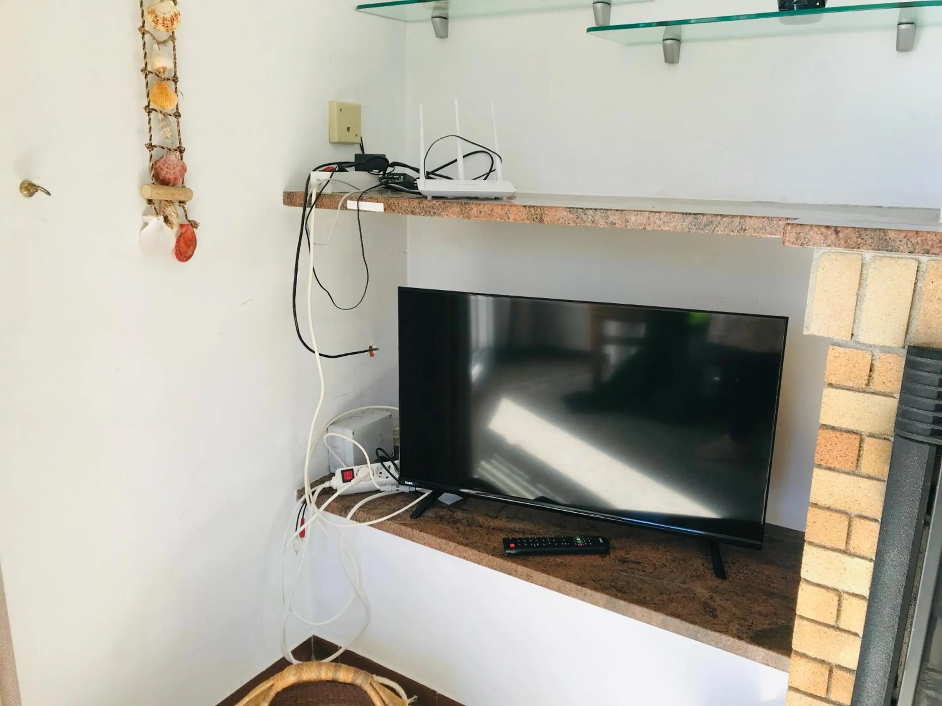 TV and multimedia in Mediterranean Villa Investingspain sea view and pool