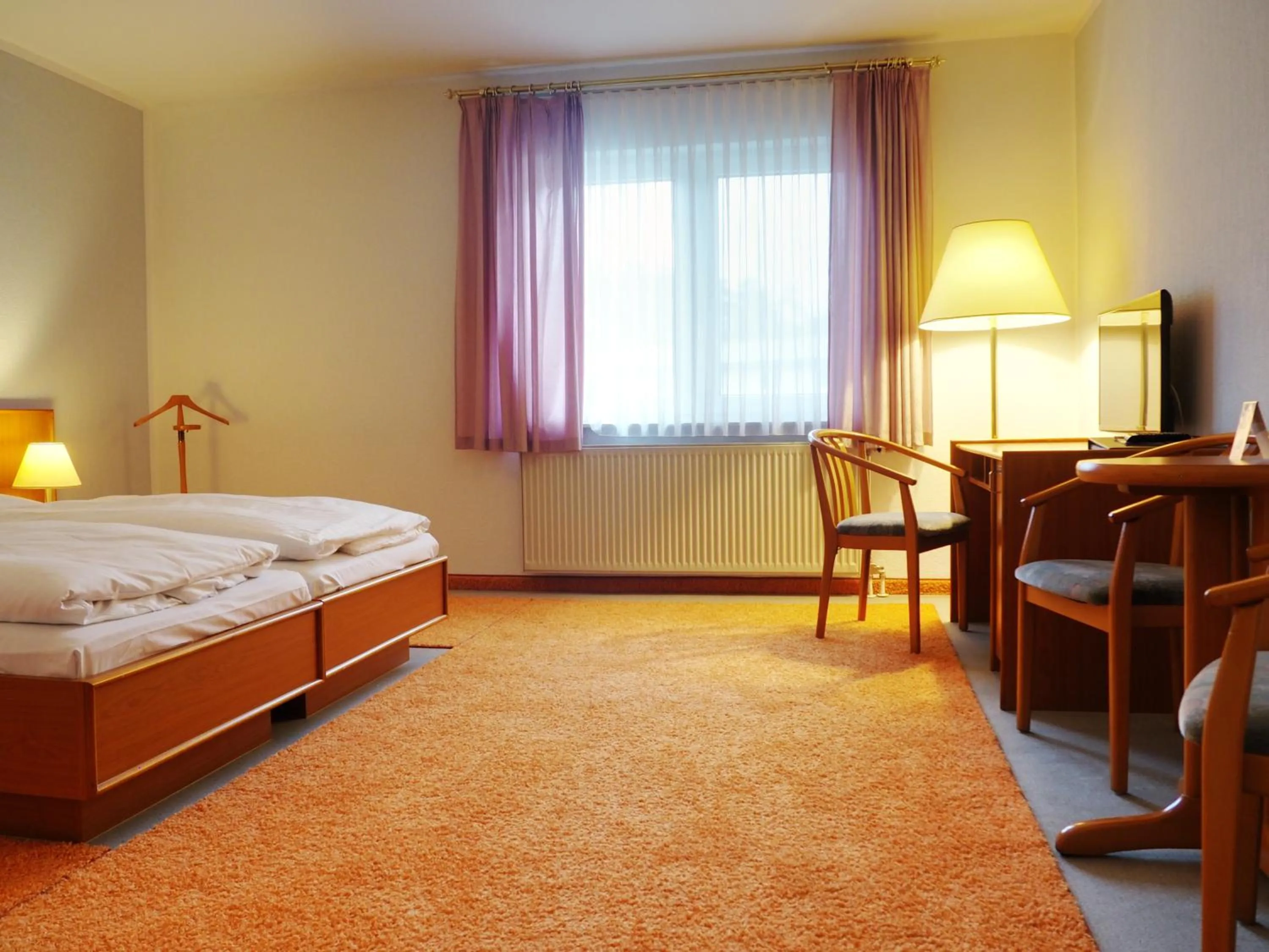 Bed in Heidehotel Lubast