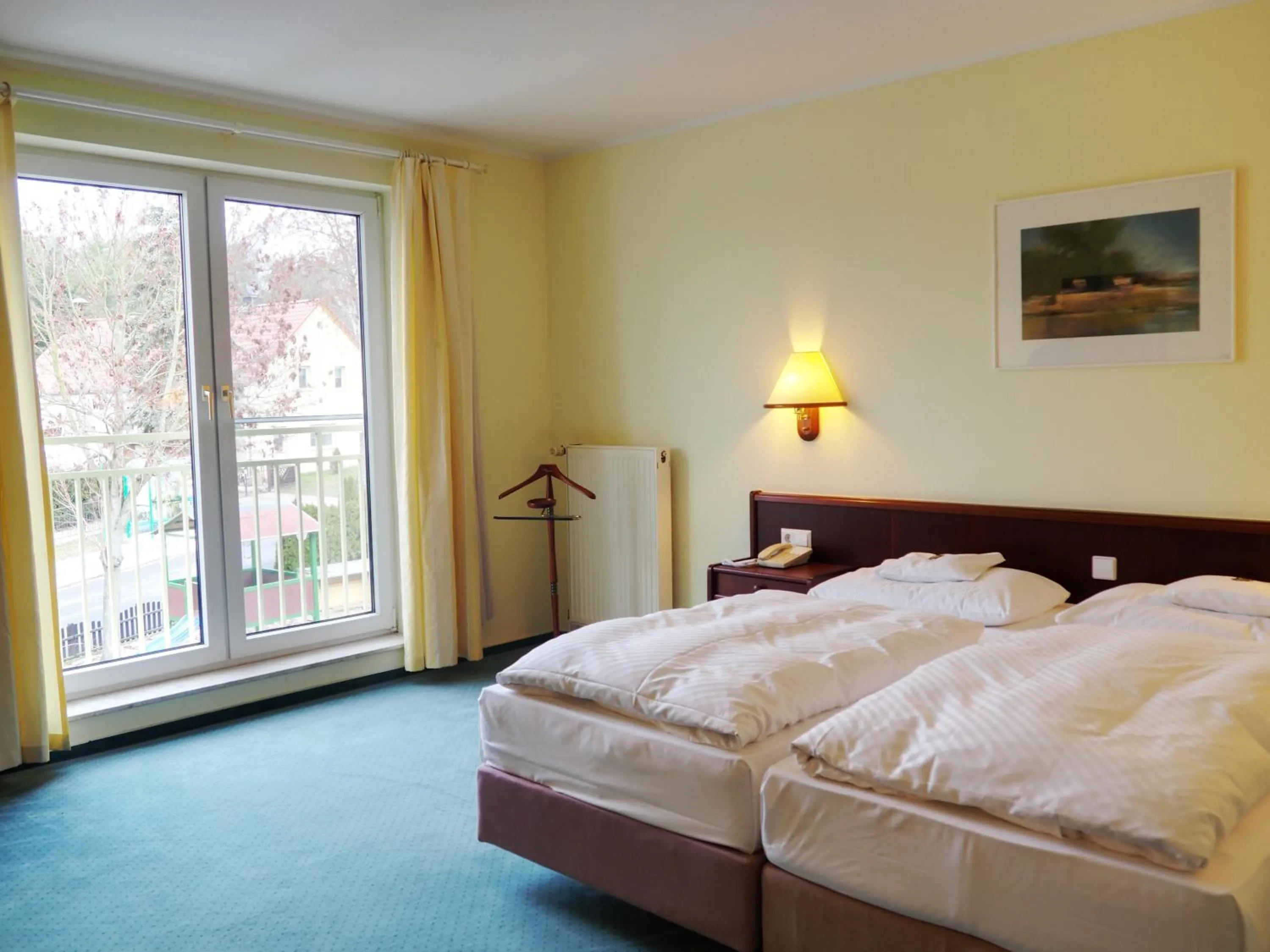 Bed in Heidehotel Lubast