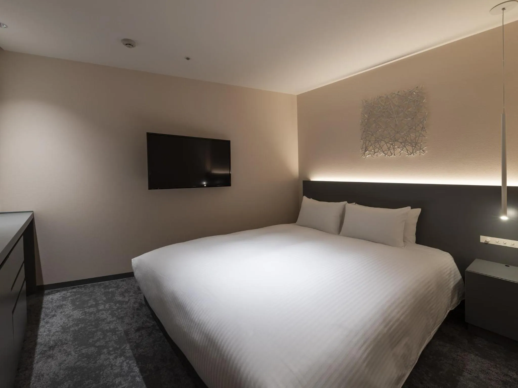 Bed in HOTEL FORZA SAPPORO STATION