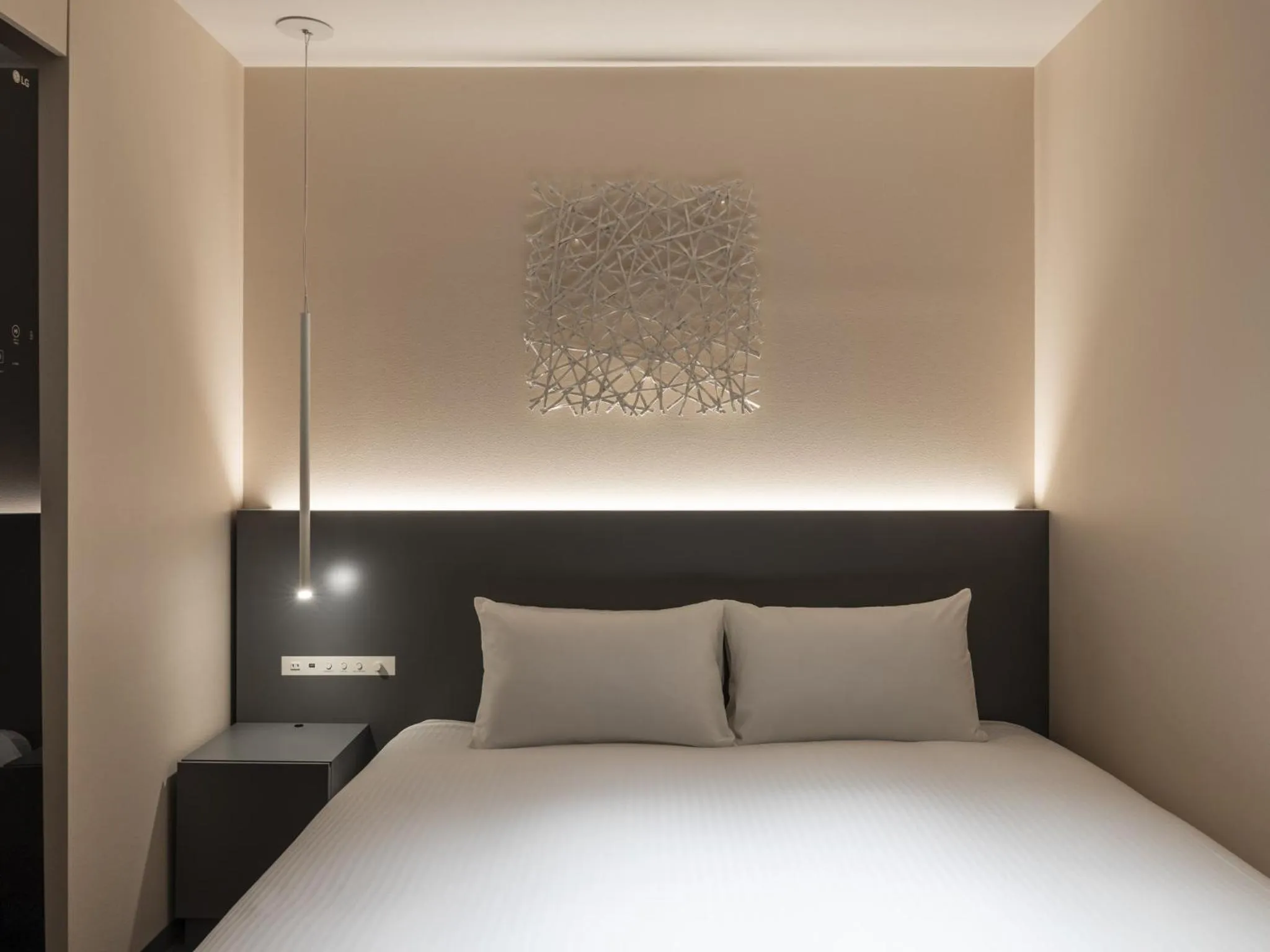 Bed in HOTEL FORZA SAPPORO STATION