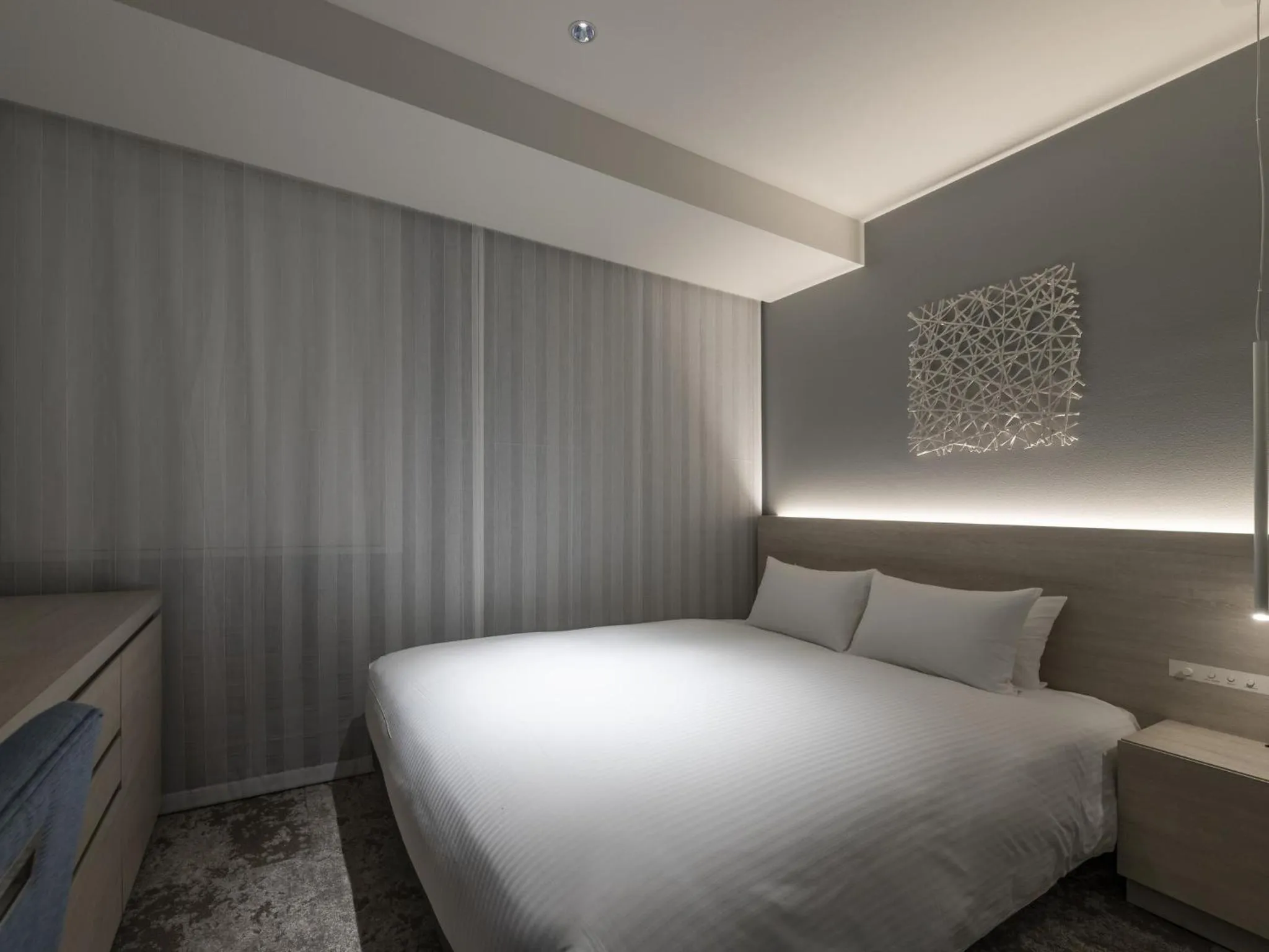 Bed in HOTEL FORZA SAPPORO STATION