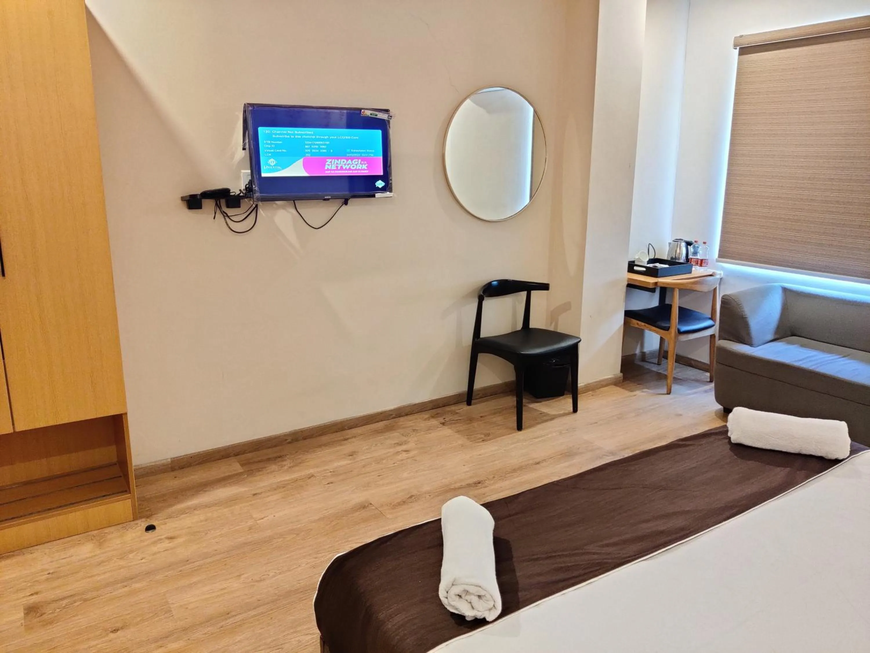 Seating area, Bed in Vishnu Paradise