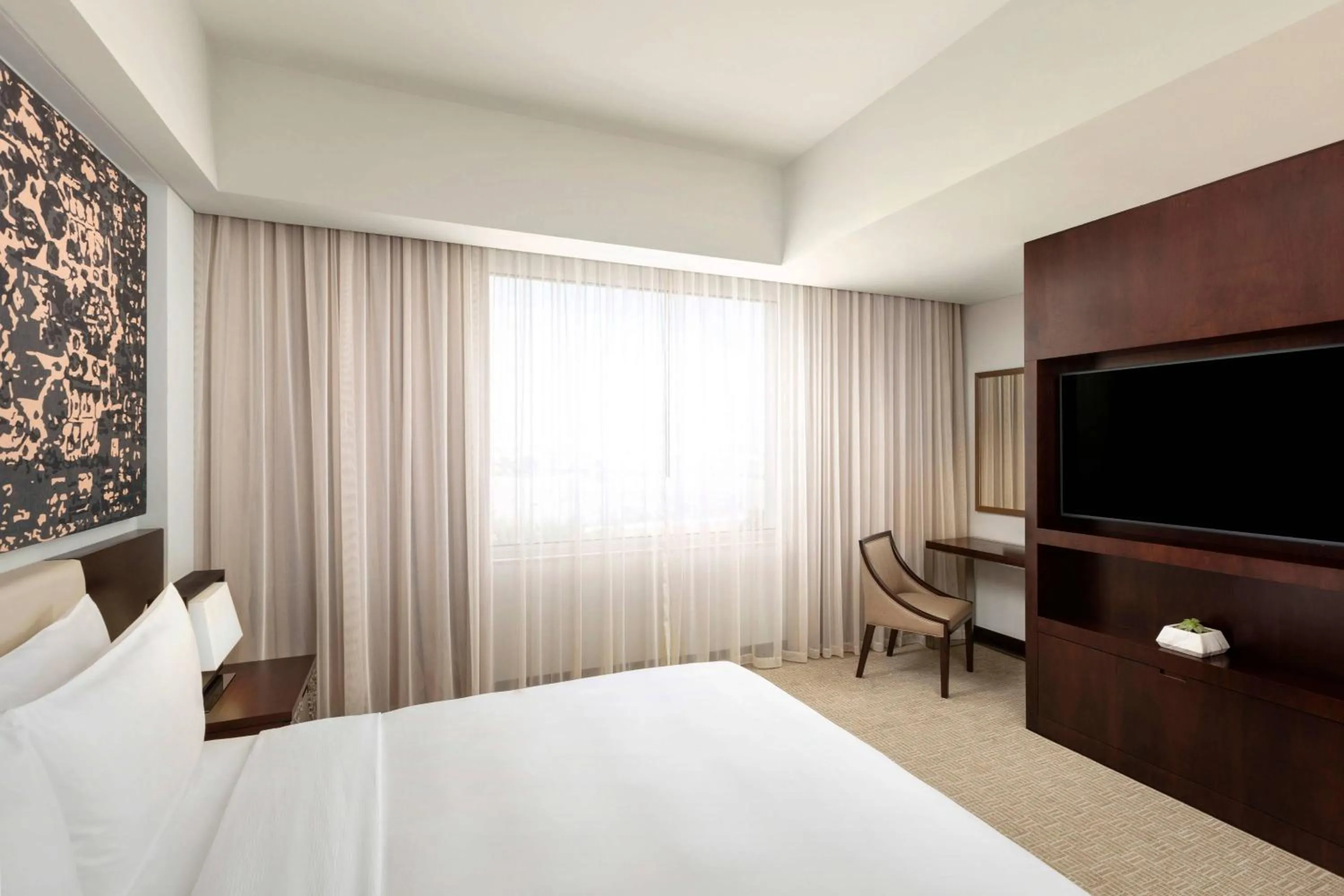 Photo of the whole room, Bed in JW Marriott Hotel Muscat