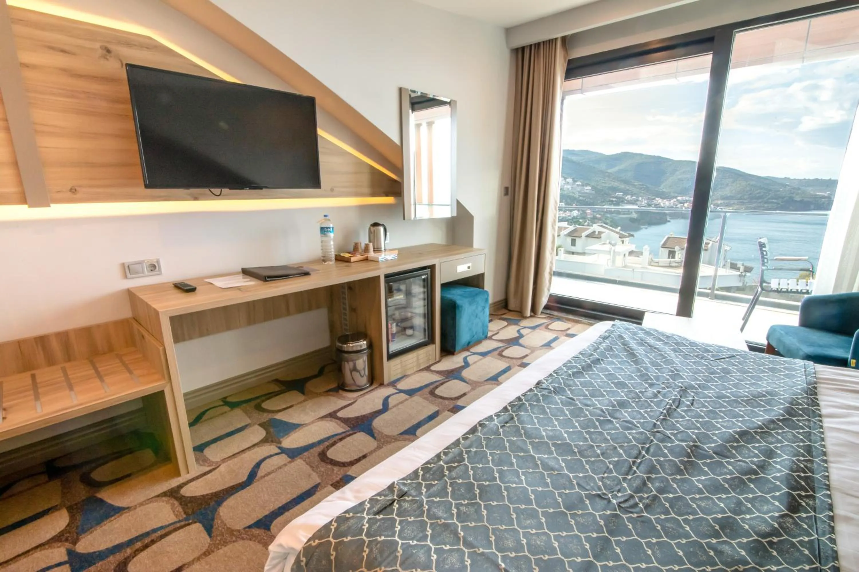 Bed in BLUE MUDANYA HOTEL