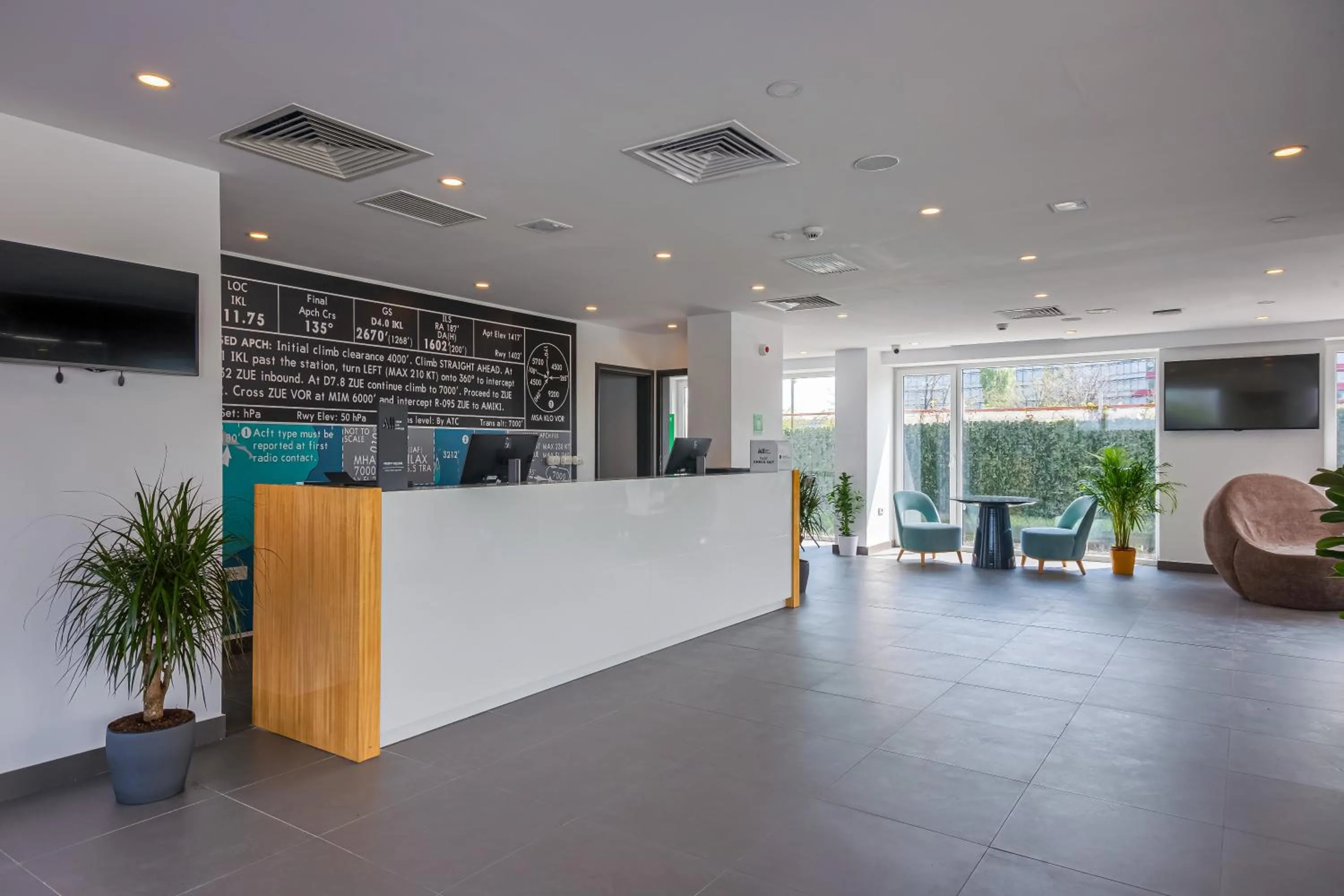 Lobby or reception in Ibis Styles Bucharest Airport