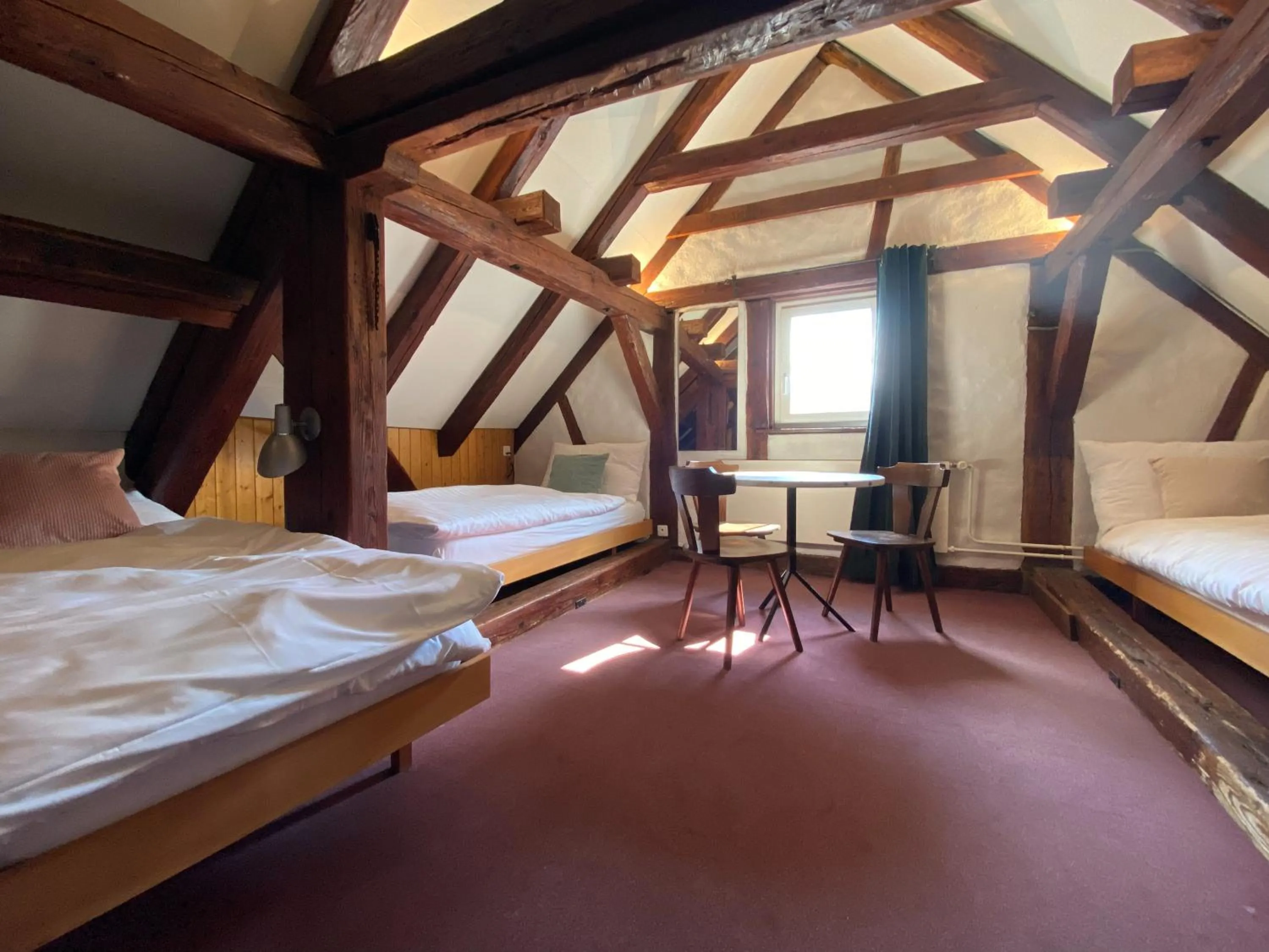 Bed in Hotel Untertor by Maier - Self-Check-in