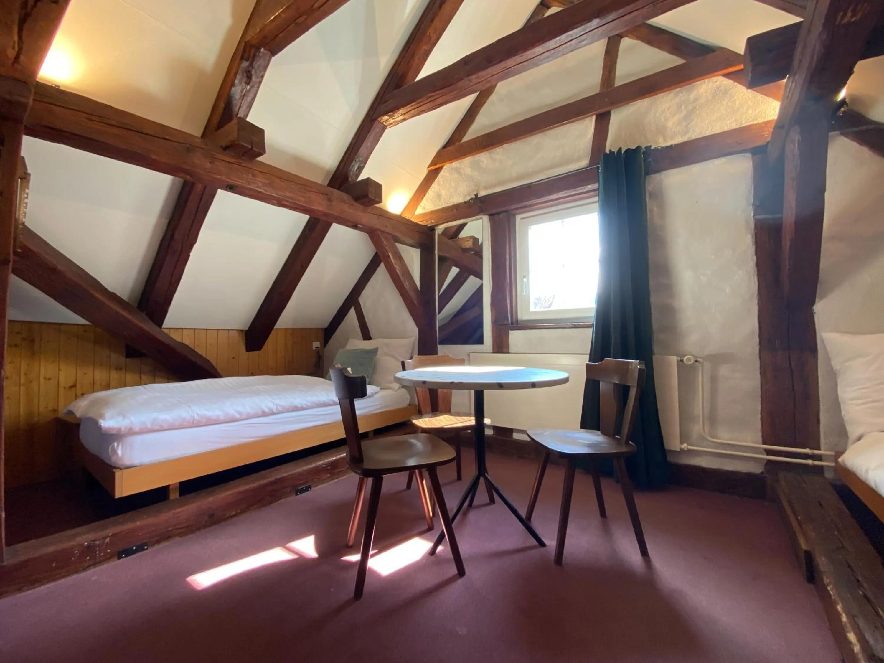 Bed in Hotel Untertor by Maier - Self-Check-in