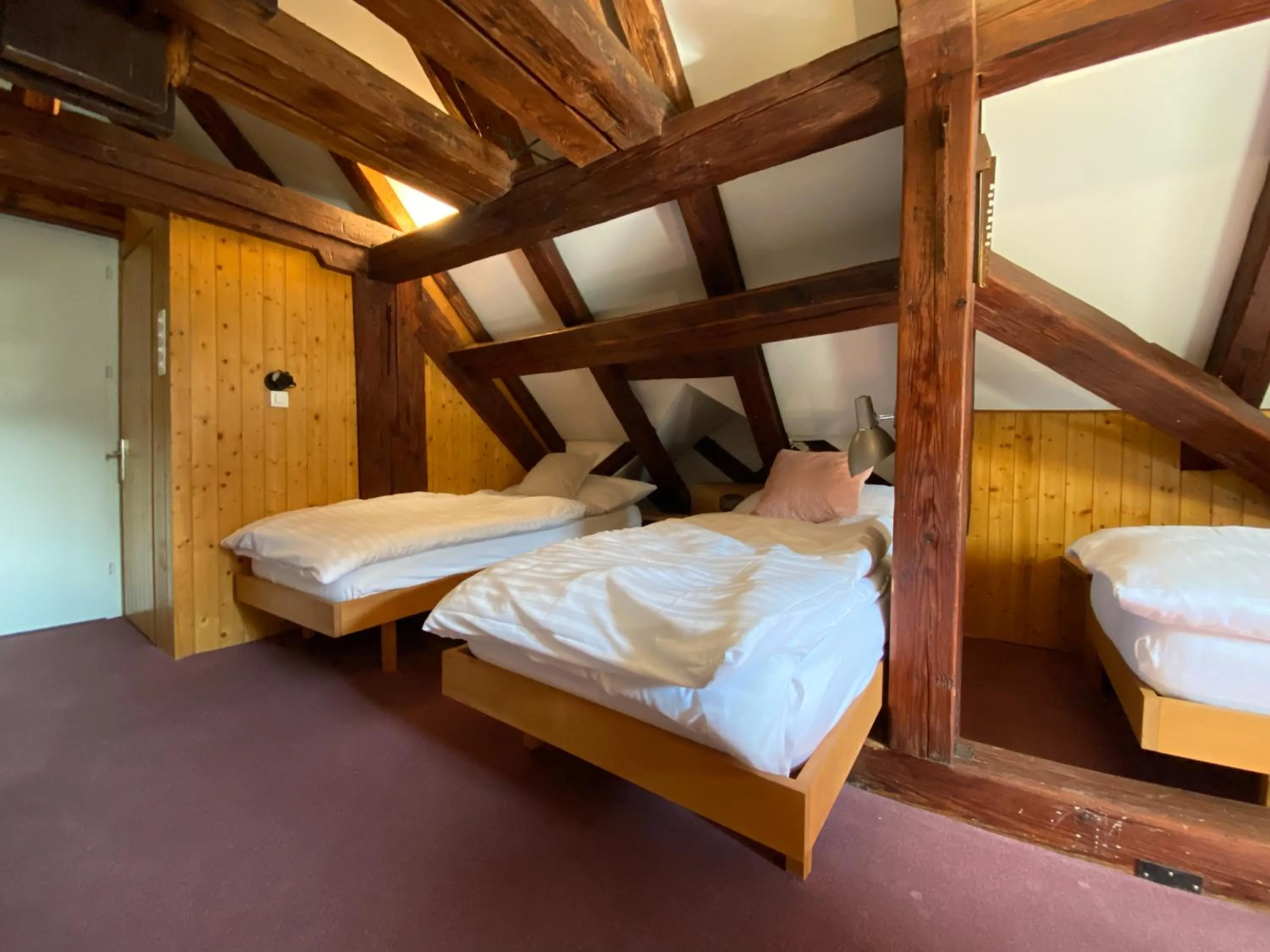 Bed in Hotel Untertor by Maier - Self-Check-in