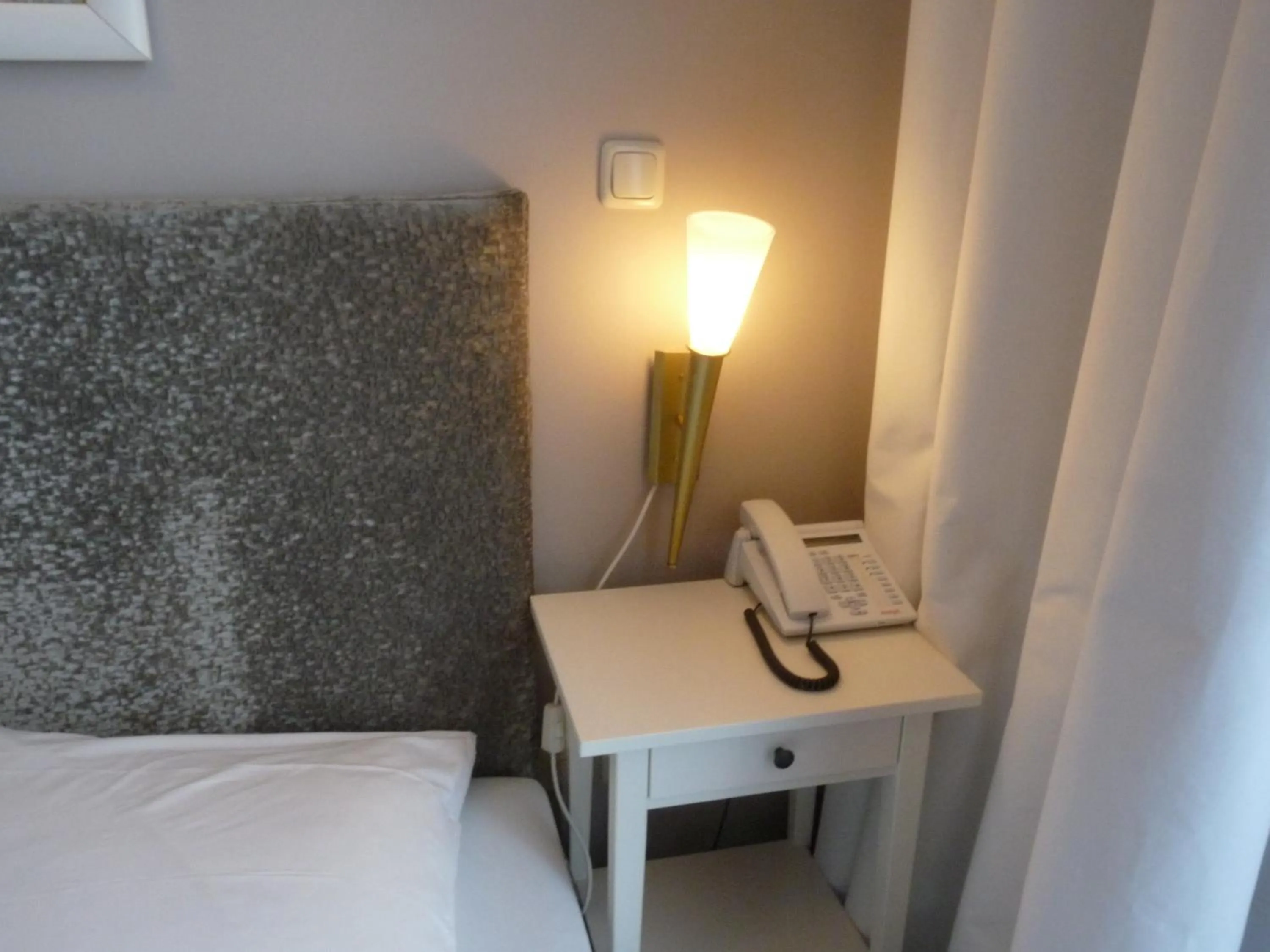 Bed in Hotel Commodore