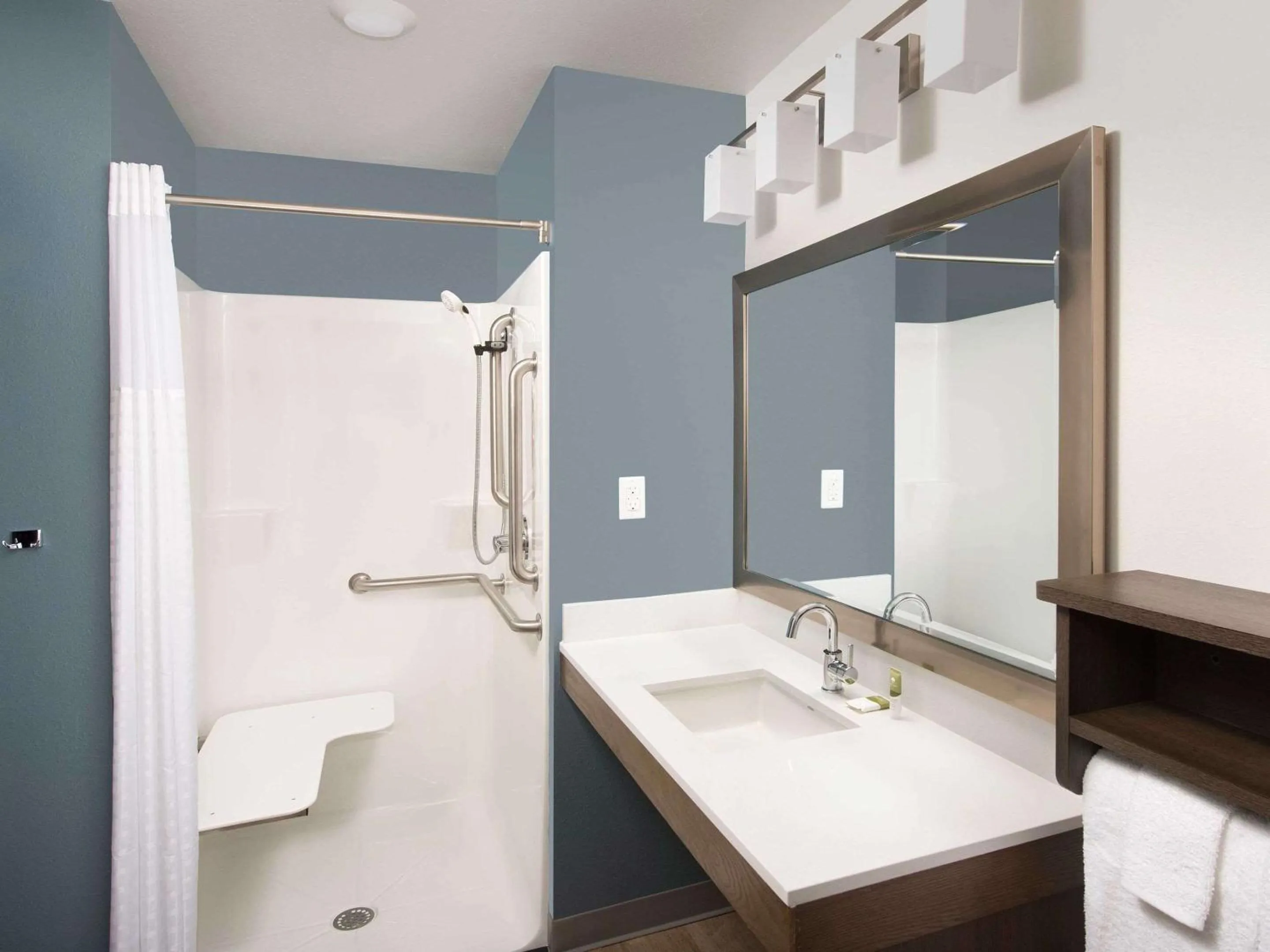 Bathroom in WoodSpring Suites Toledo Maumee