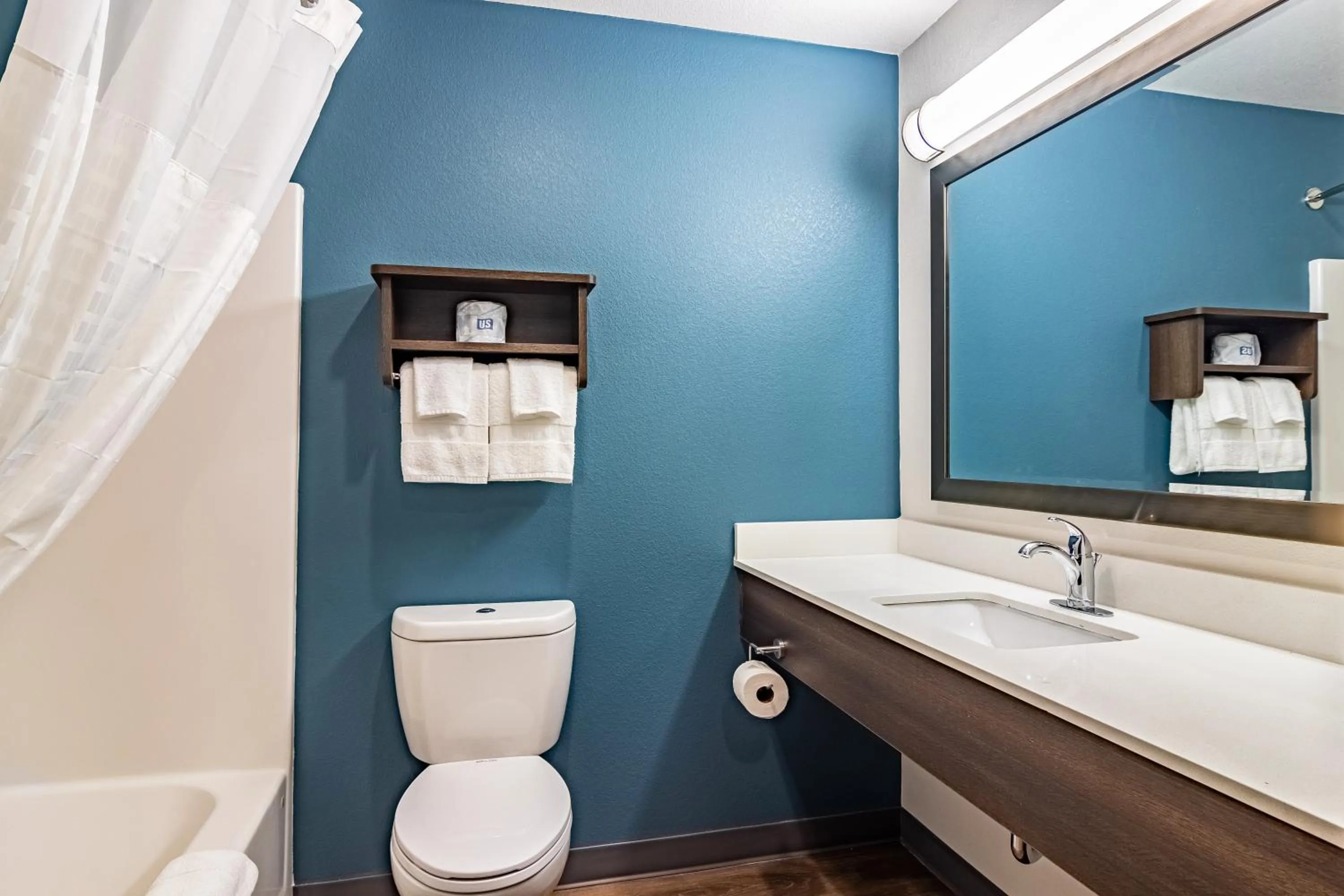 Bathroom in WoodSpring Suites Toledo Maumee