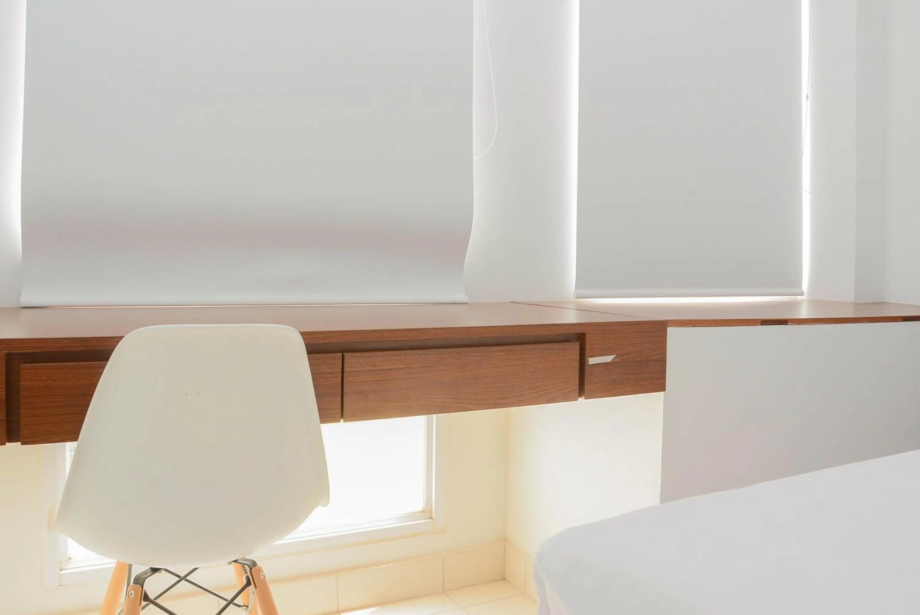 Bedroom, Bed in Town View Apartment Studio Patraland Urbano By Travelio