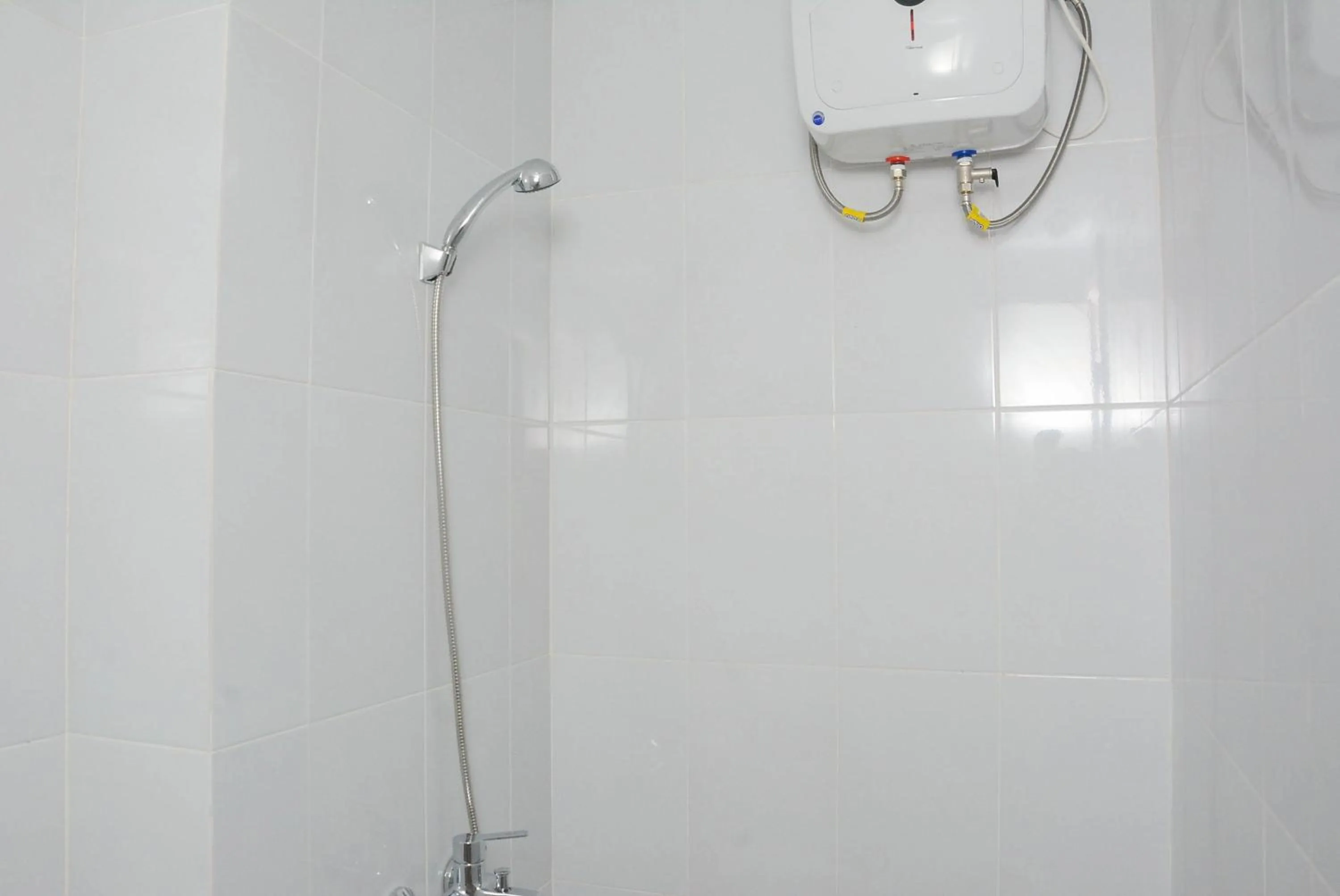 Bathroom in Town View Apartment Studio Patraland Urbano By Travelio