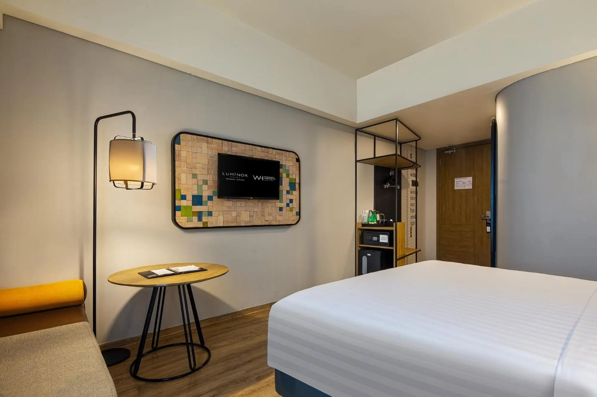 Bedroom, Bed in Luminor Hotel Purwokerto By WH