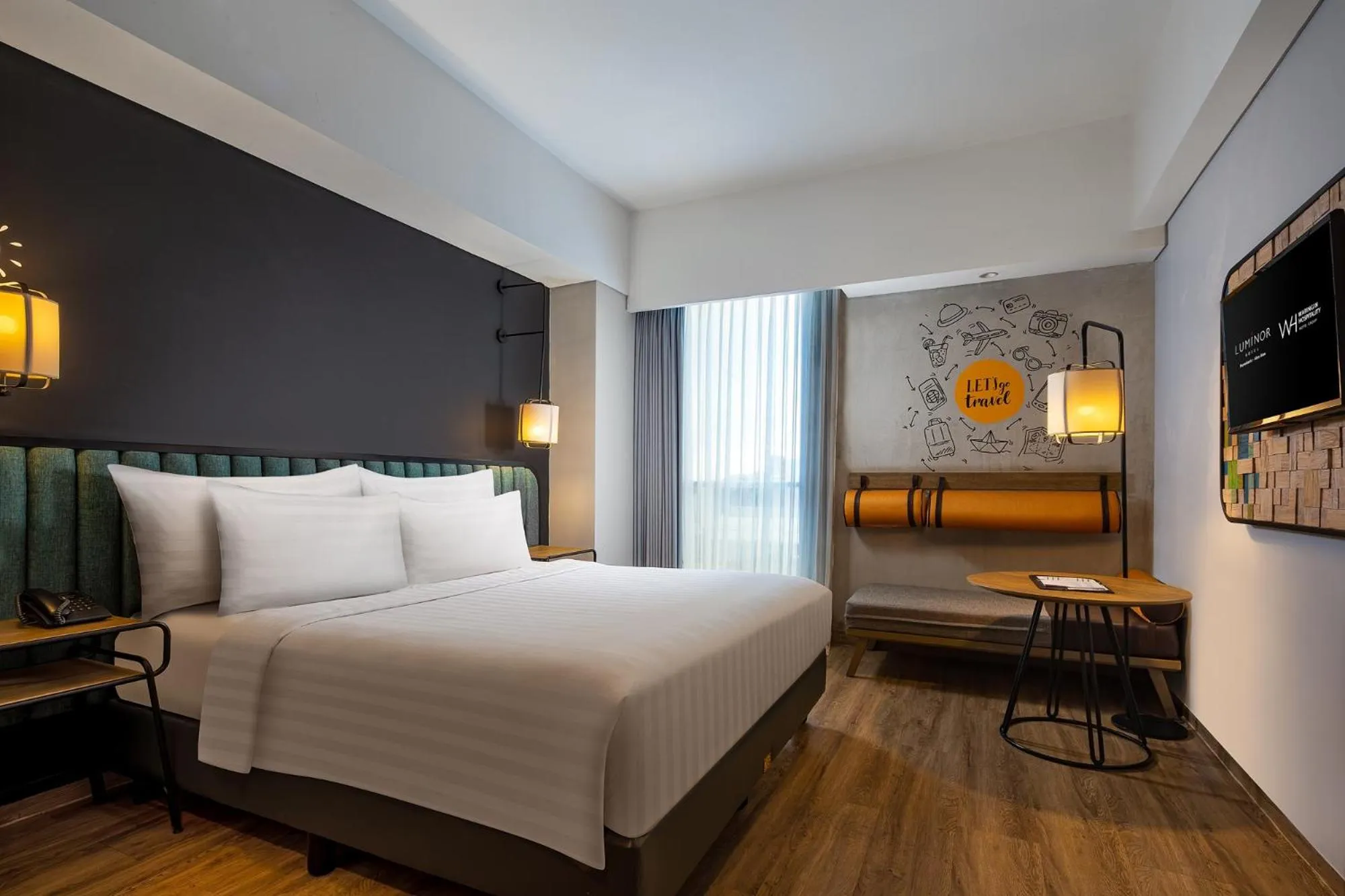 Bedroom, Bed in Luminor Hotel Purwokerto By WH
