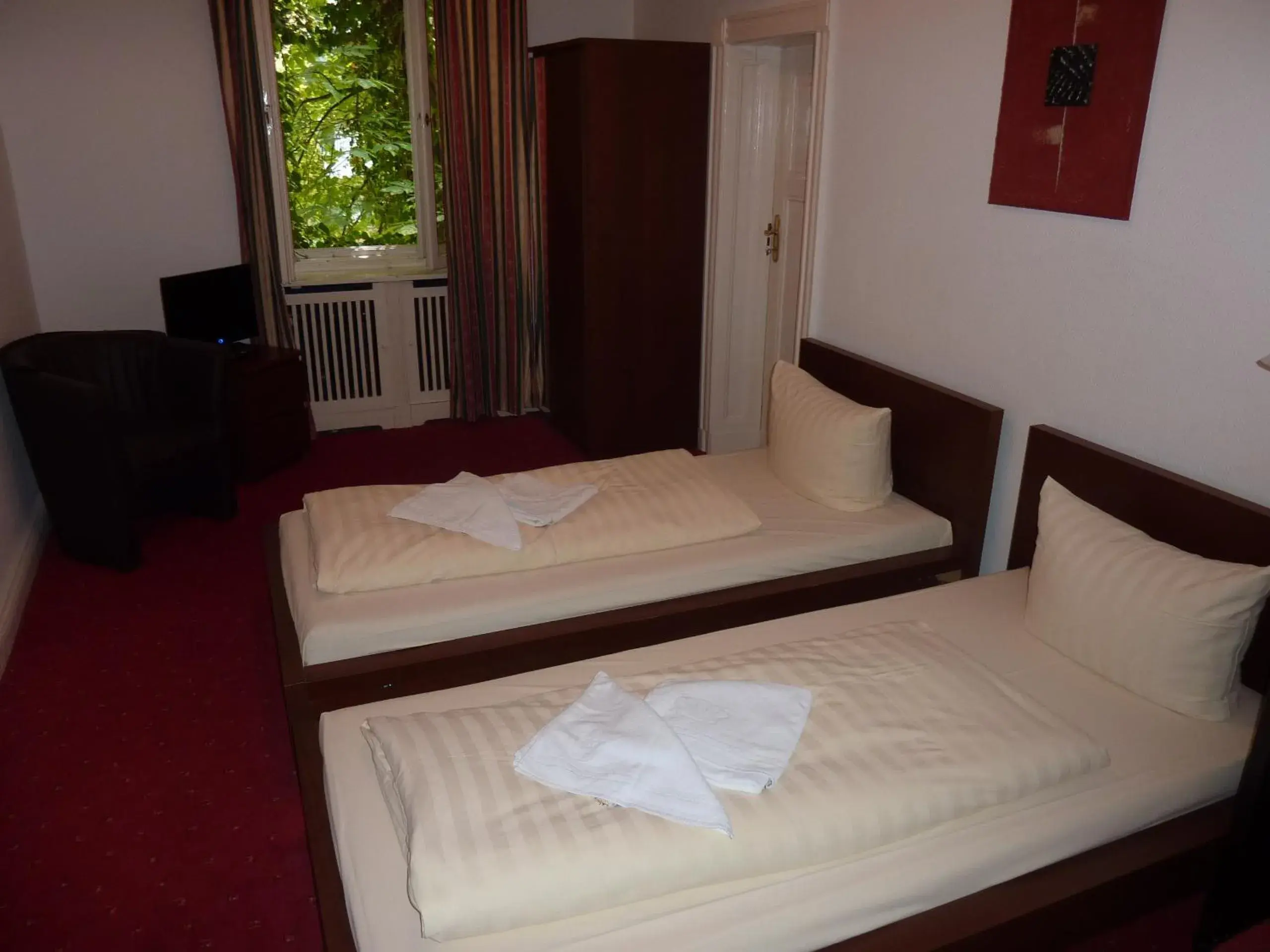 Twin Room in Hotel Pension Kima Twin Room in Hotel Pension Kima