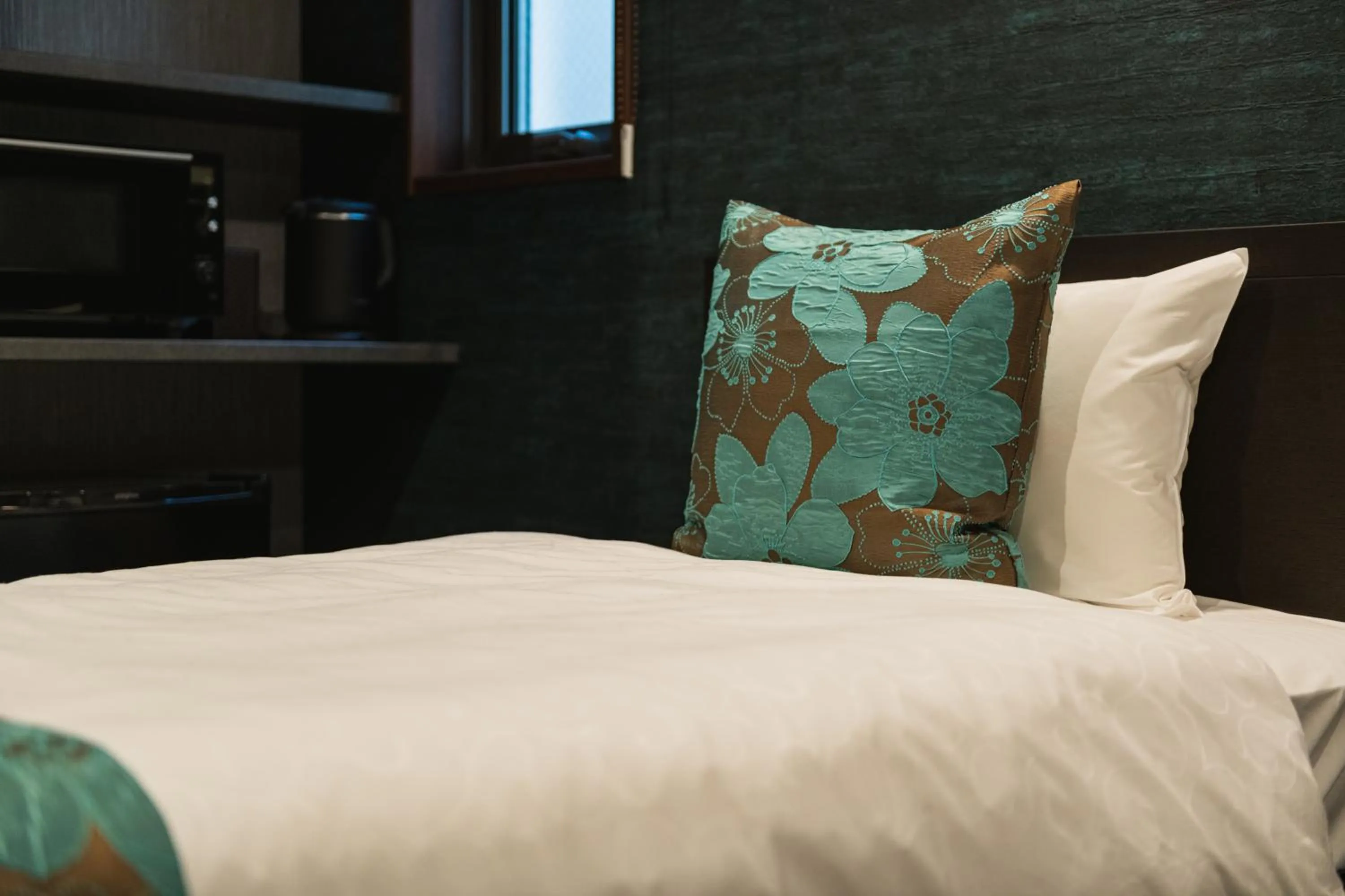 Bed in GRAND BASE Haruyoshi