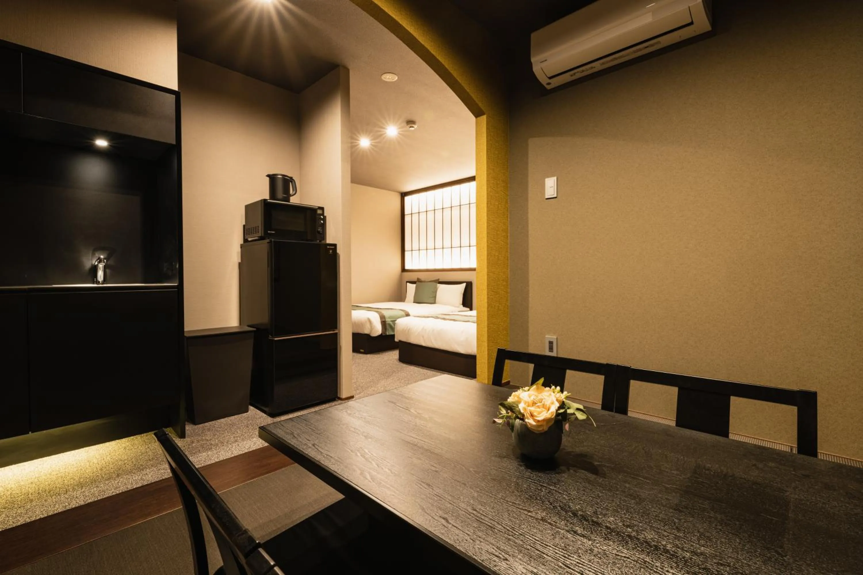 Living room, Bed in GRAND BASE Haruyoshi