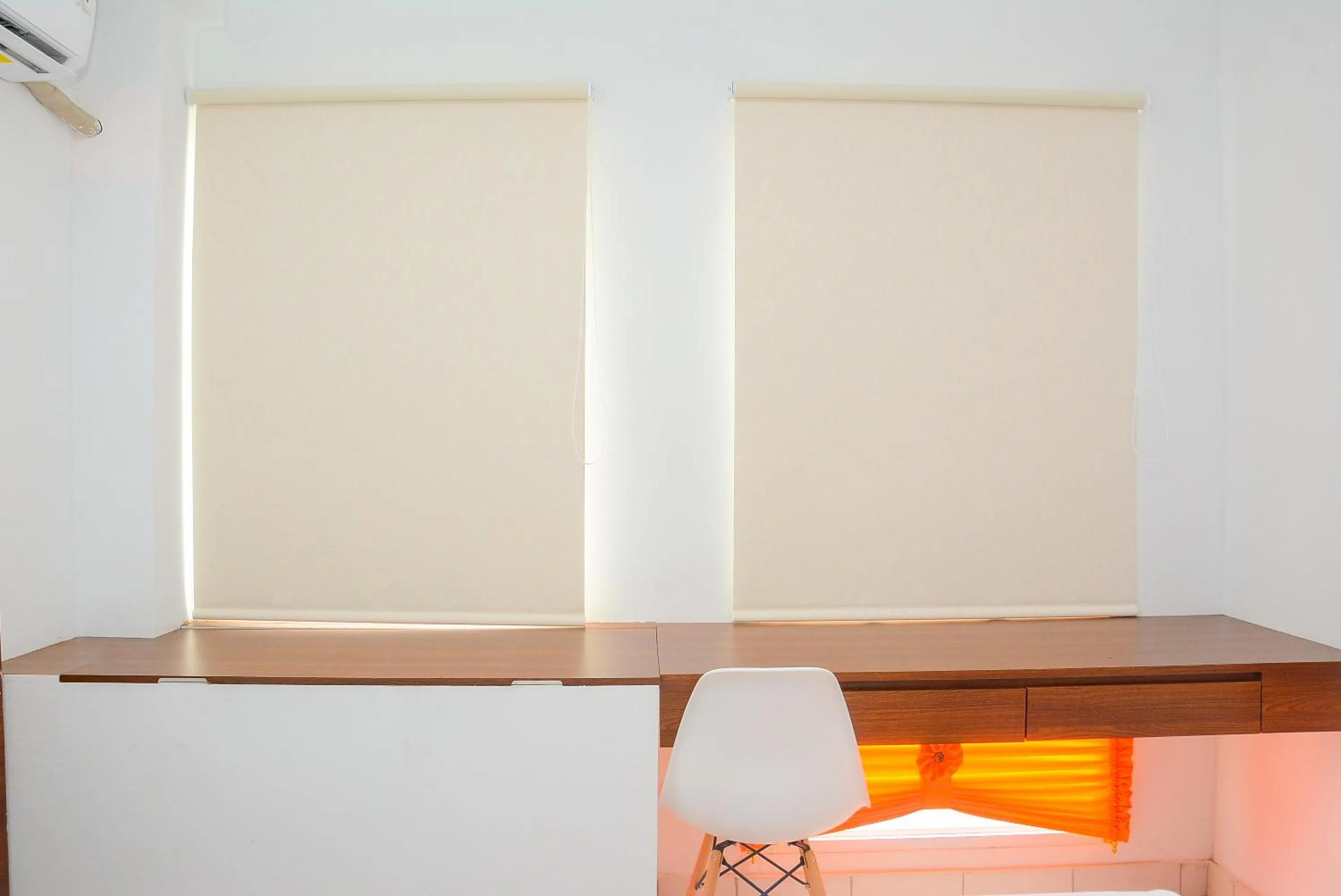 Bedroom in Comfy Studio Room at Patraland Urbano Apartment By Travelio