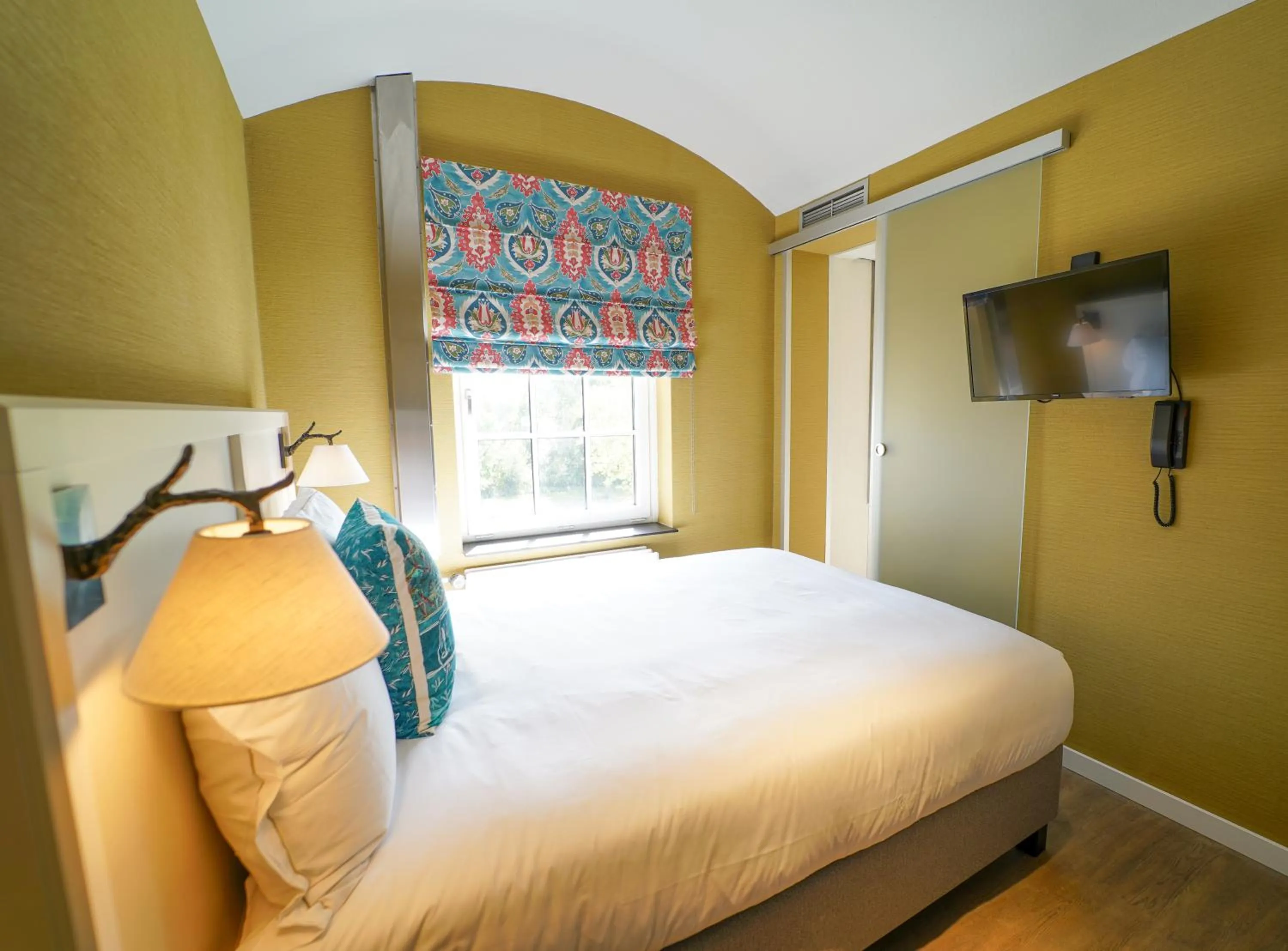 Bed in Fletcher Hotel-Restaurant De Oude Gevangenis-Alkmaar