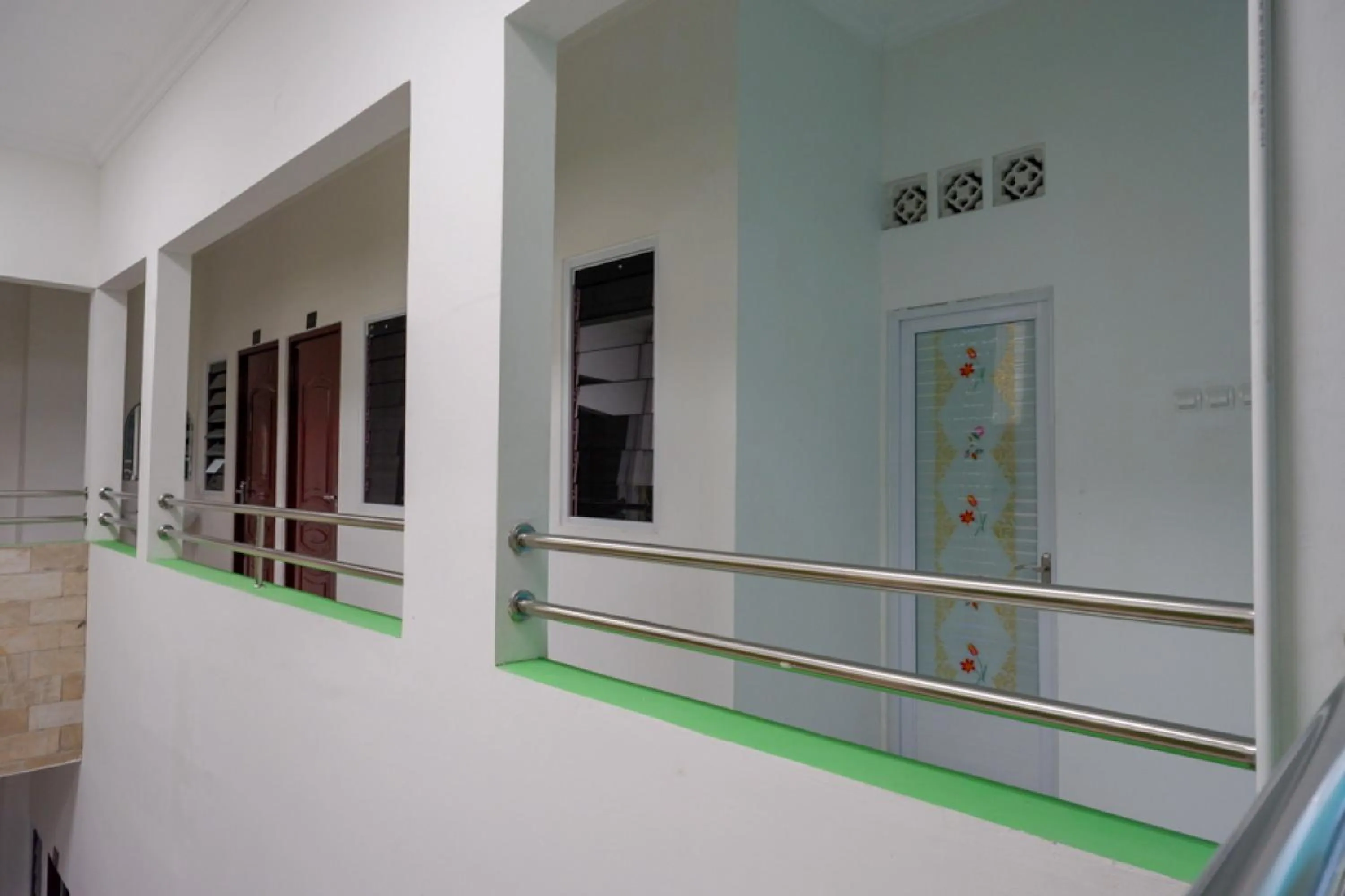 Facade/entrance in RedDoorz Hostel near Kota Lama Semarang