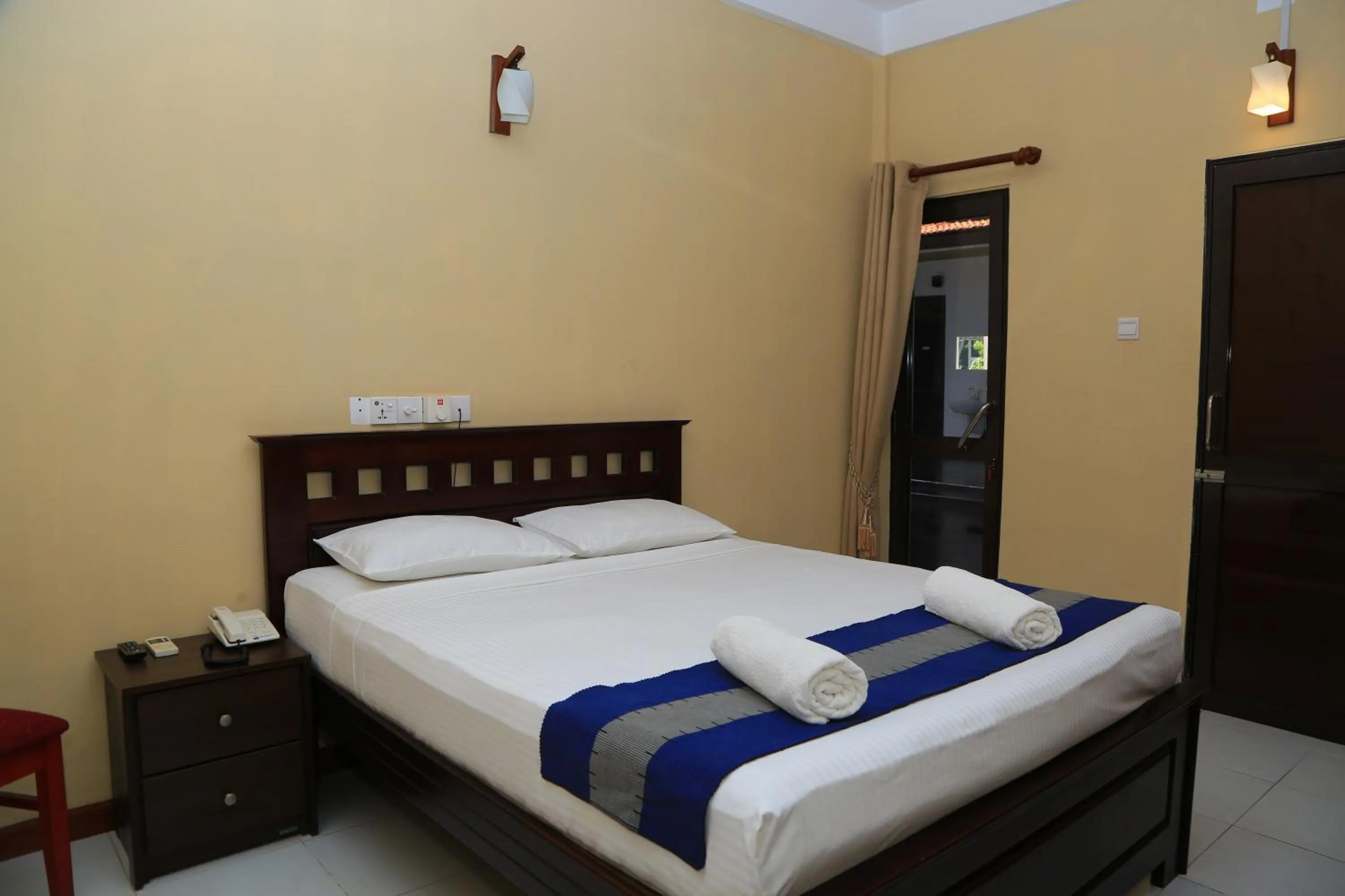 Bed in PJ Hotels Jaffna