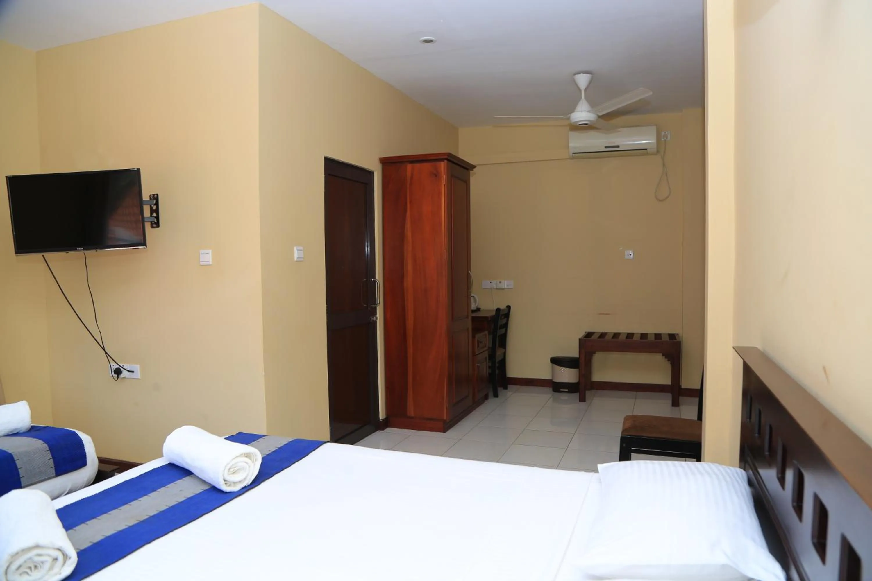 Bed in PJ Hotels Jaffna