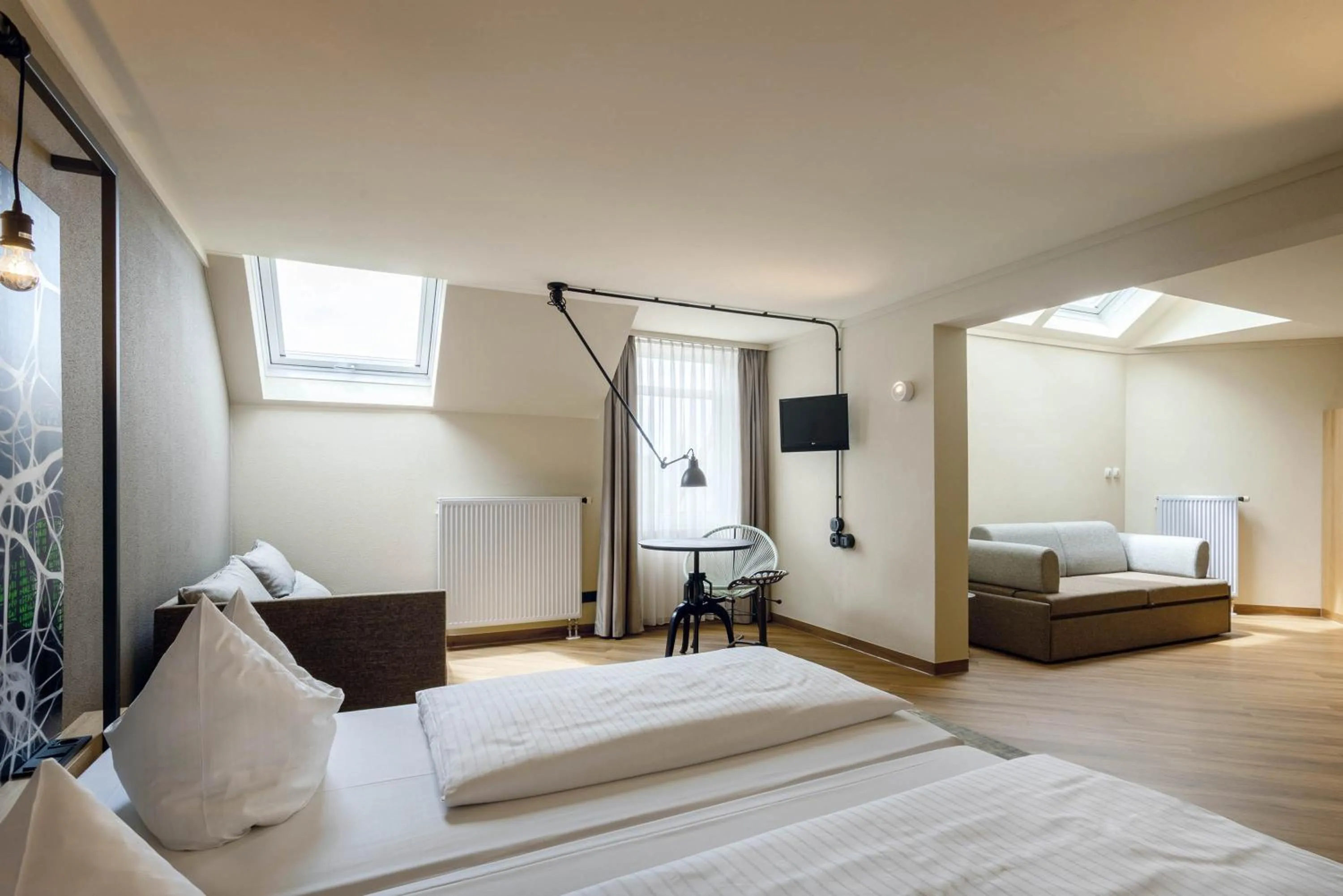 Living room, Bed in Seminaris Hotel Bad Boll