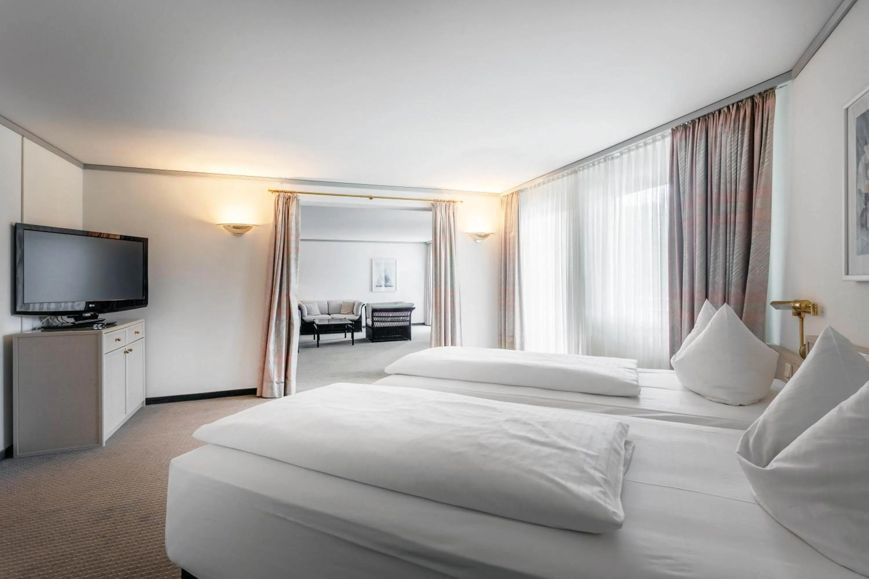 Living room, Bed in Seminaris Hotel Bad Boll