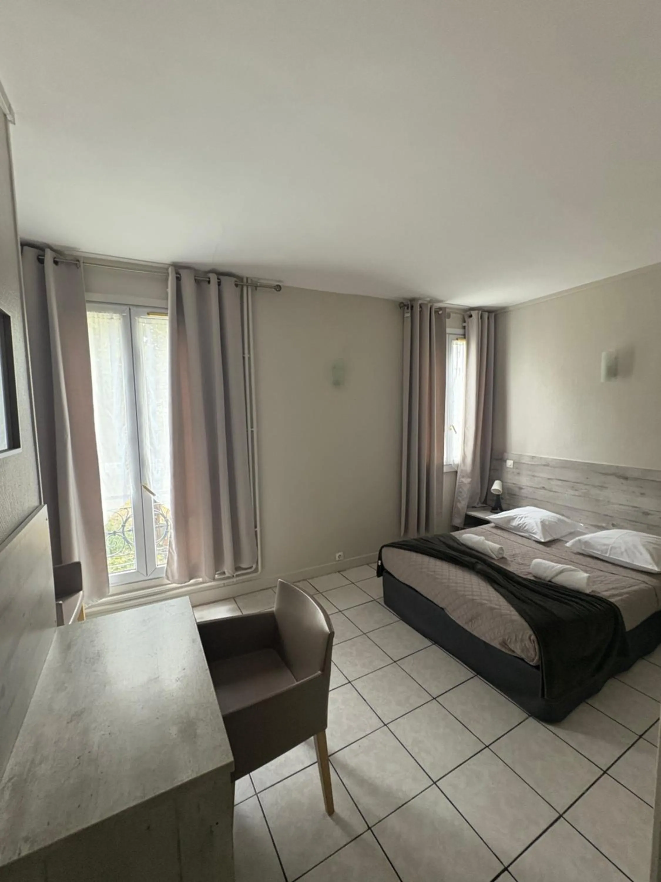 Bed in HOTEL DU MONT LOUIS