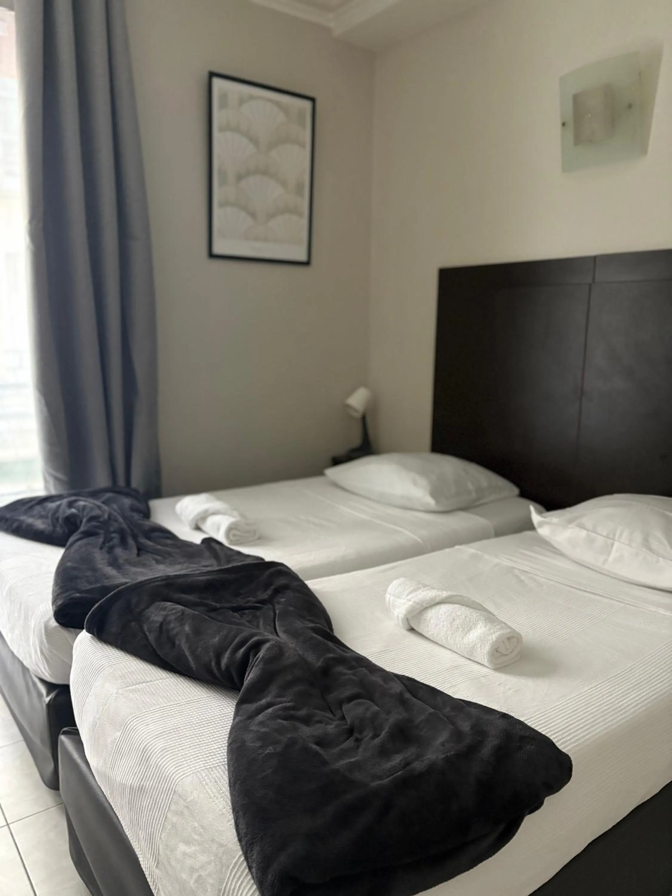 Bed in HOTEL DU MONT LOUIS