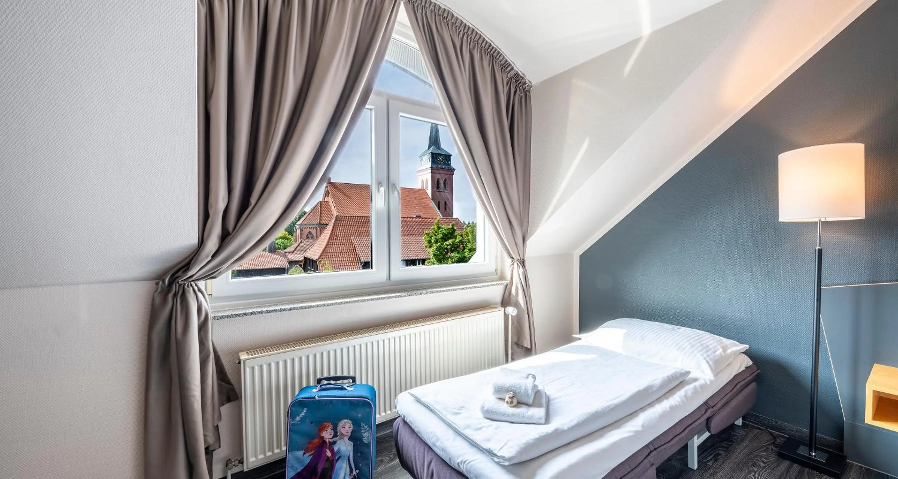 Bed in PLAZA INN Heidehof