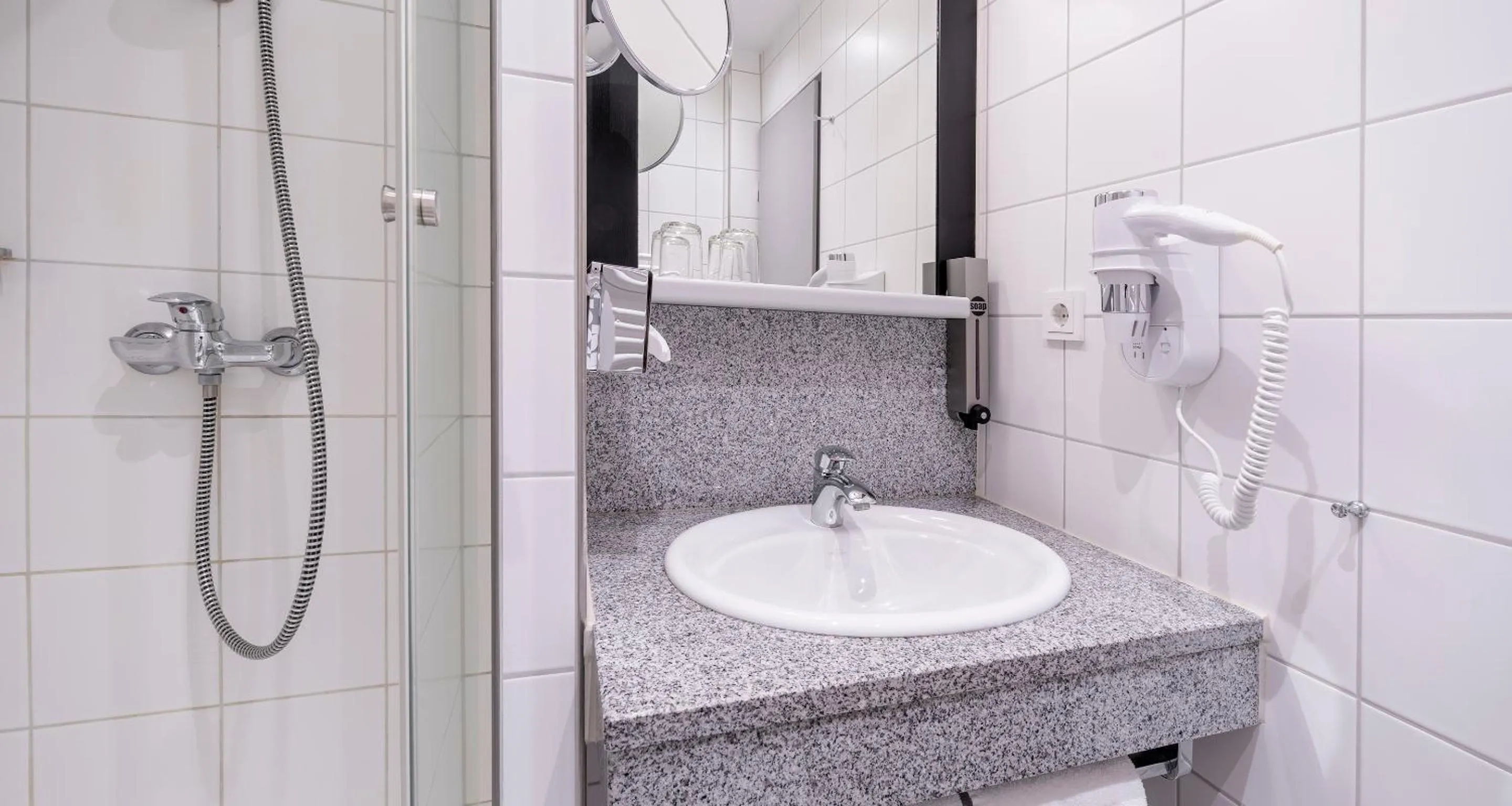 Bathroom in PLAZA INN Heidehof