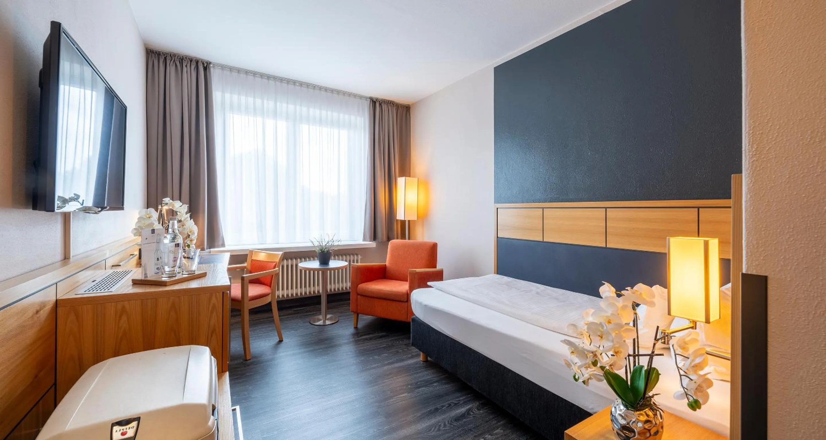 TV and multimedia, Bed in PLAZA INN Heidehof