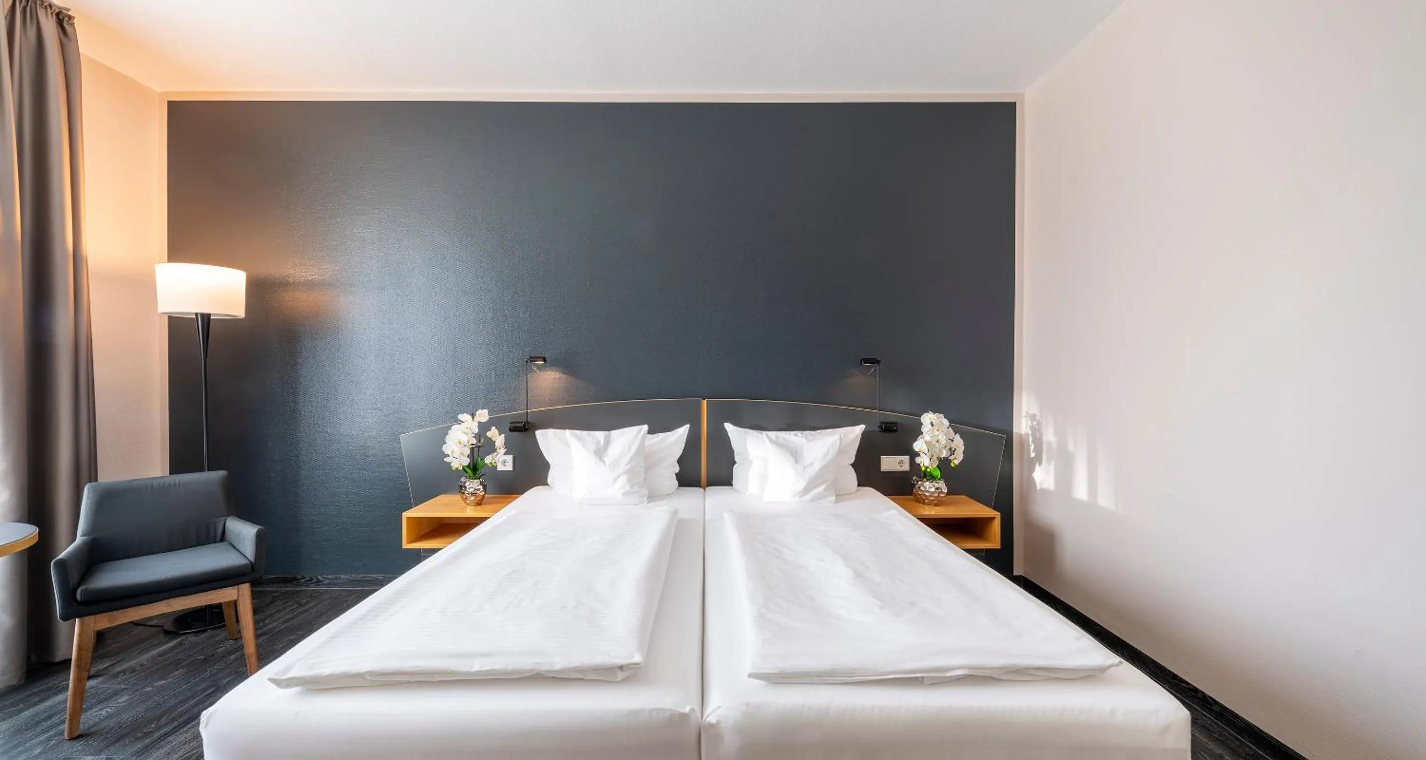 Bed in PLAZA INN Heidehof