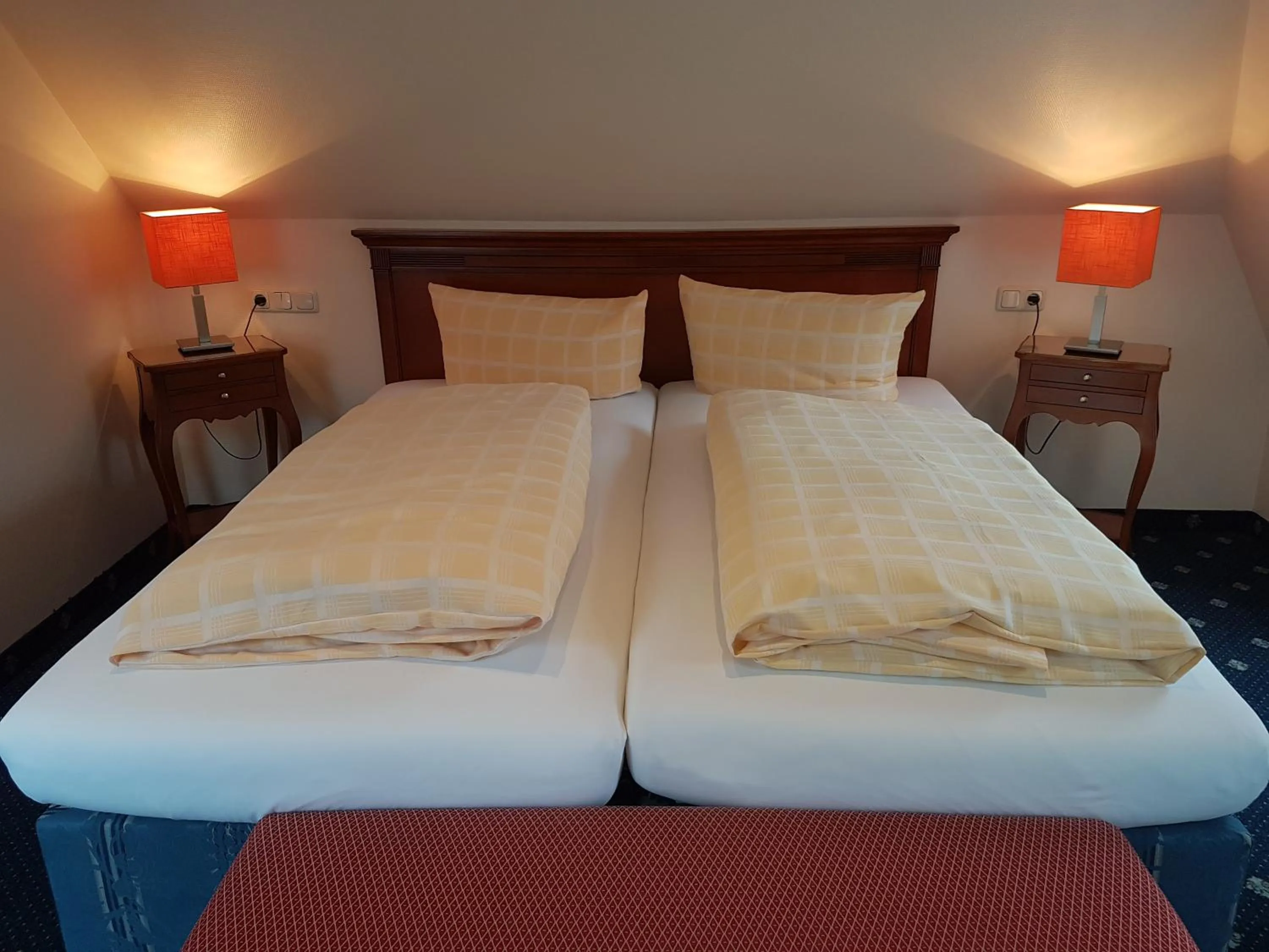 Bed in Dünenhotel am Meer