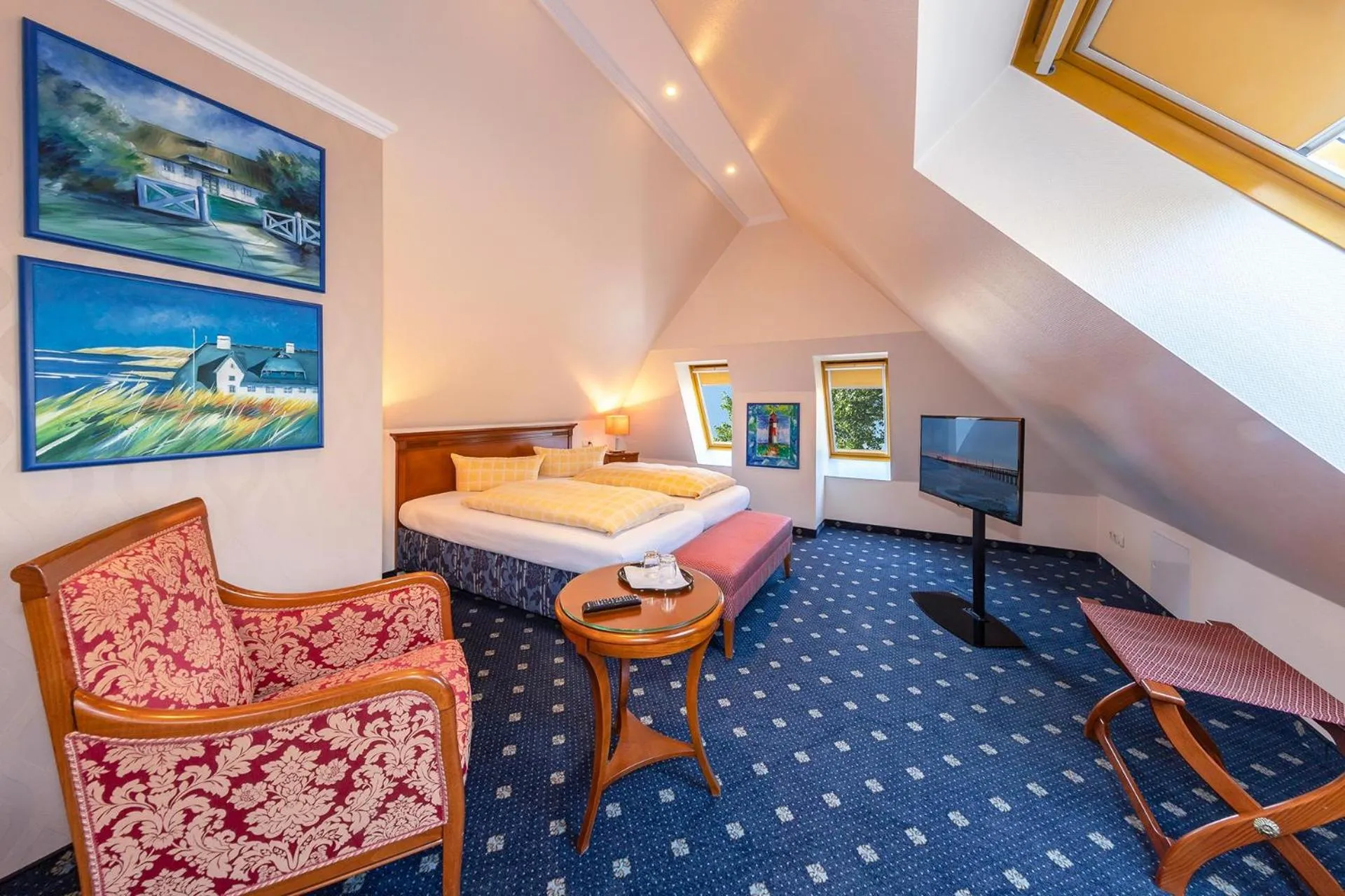 Seating area, Bed in Dünenhotel am Meer