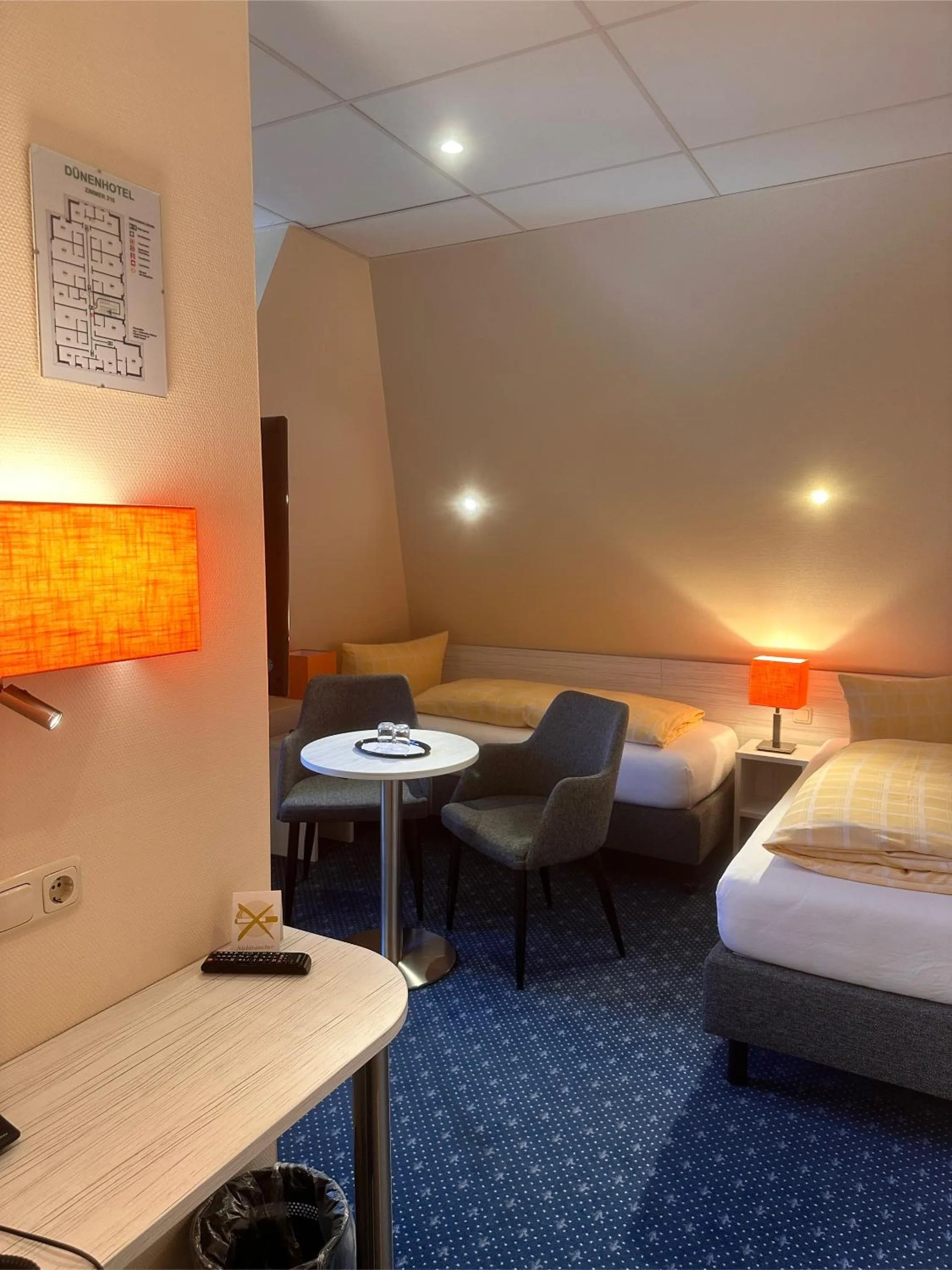 Bed in Dünenhotel am Meer