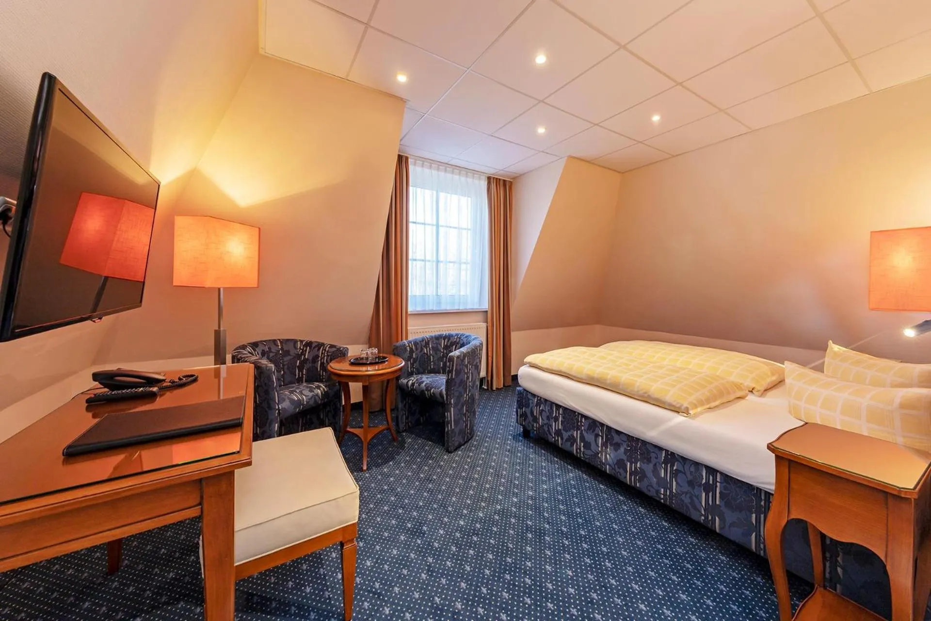 Photo of the whole room, Bed in Dünenhotel am Meer