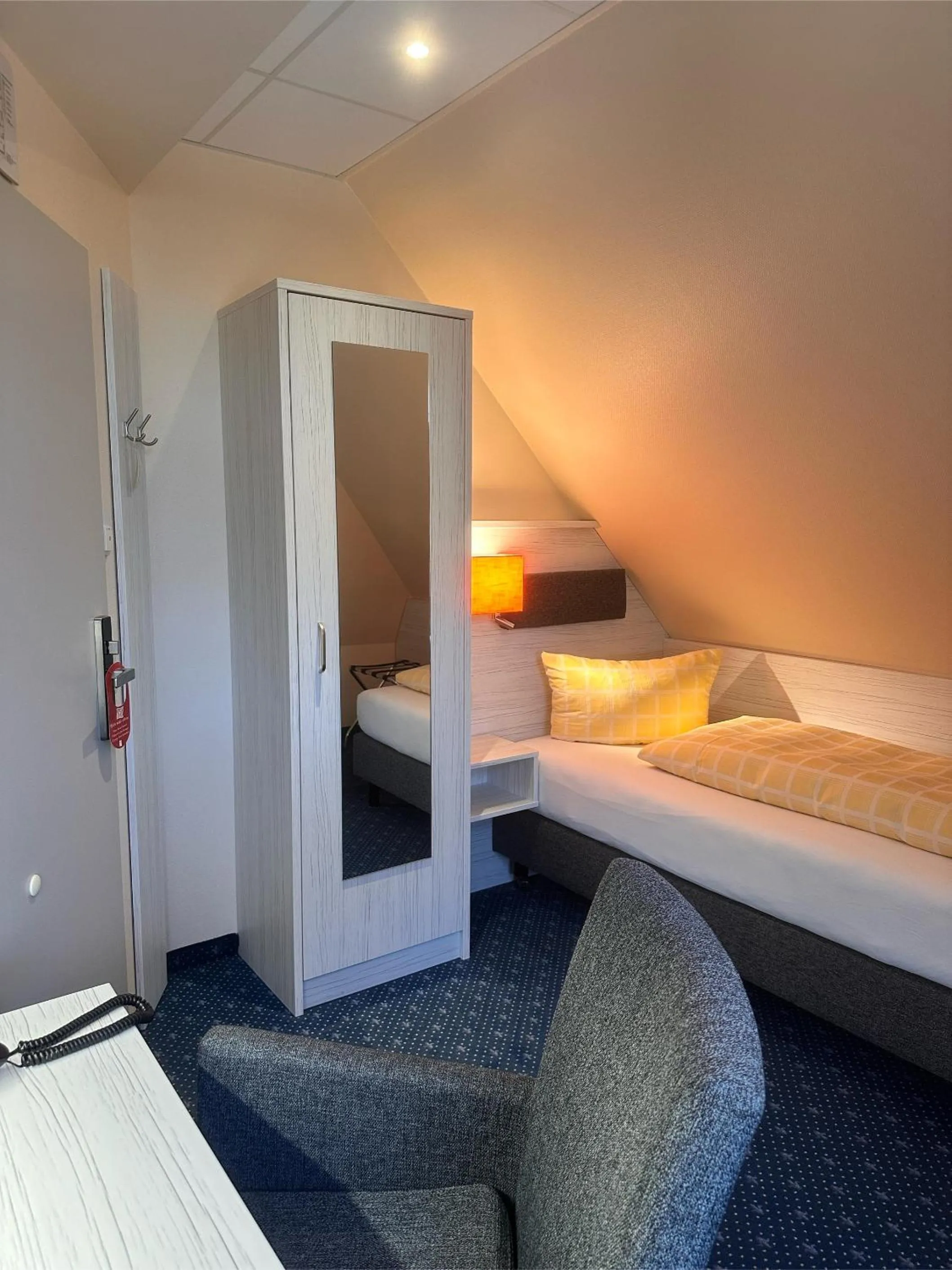 Bed in Dünenhotel am Meer