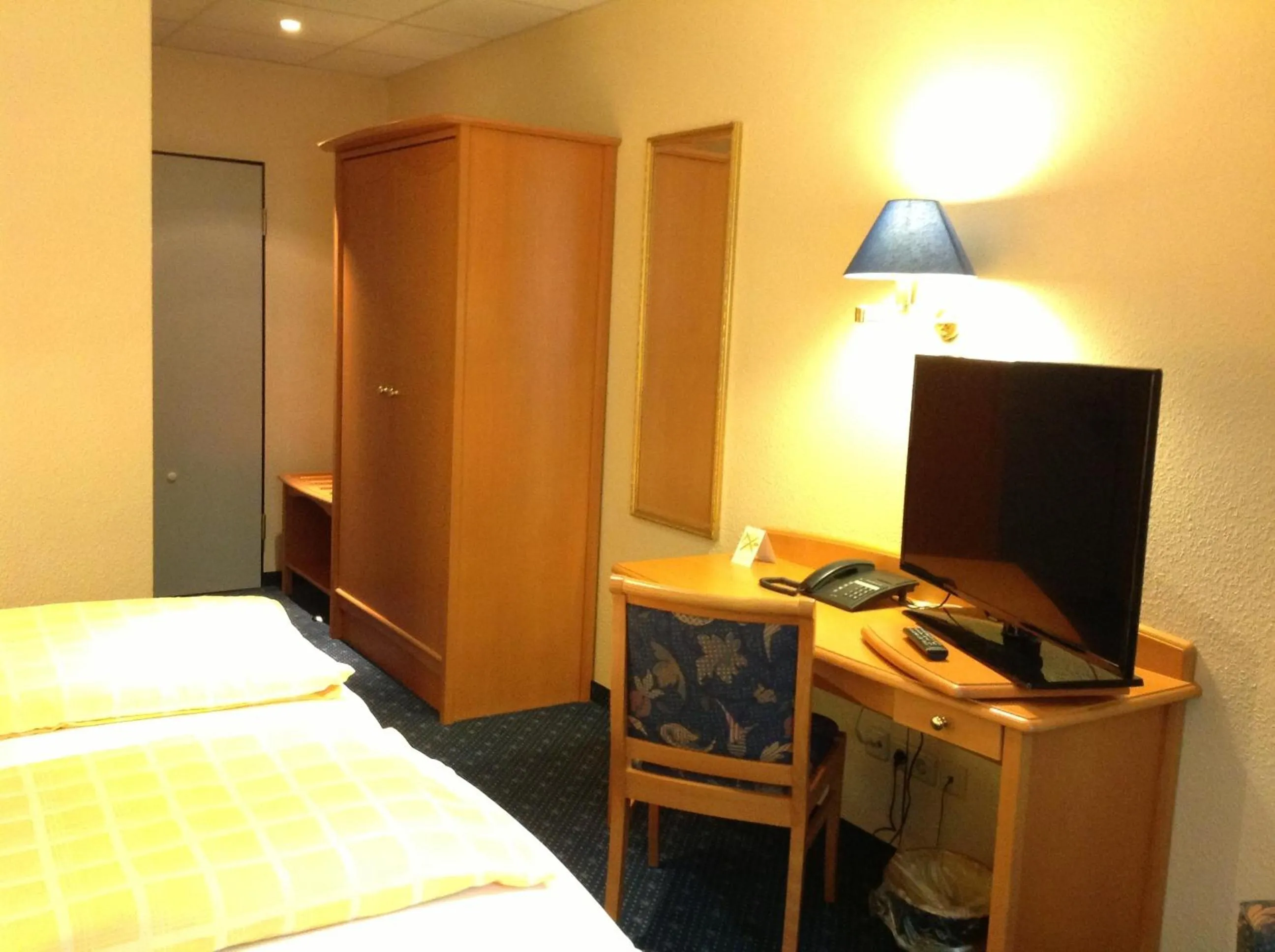 Photo of the whole room, Bed in Dünenhotel am Meer