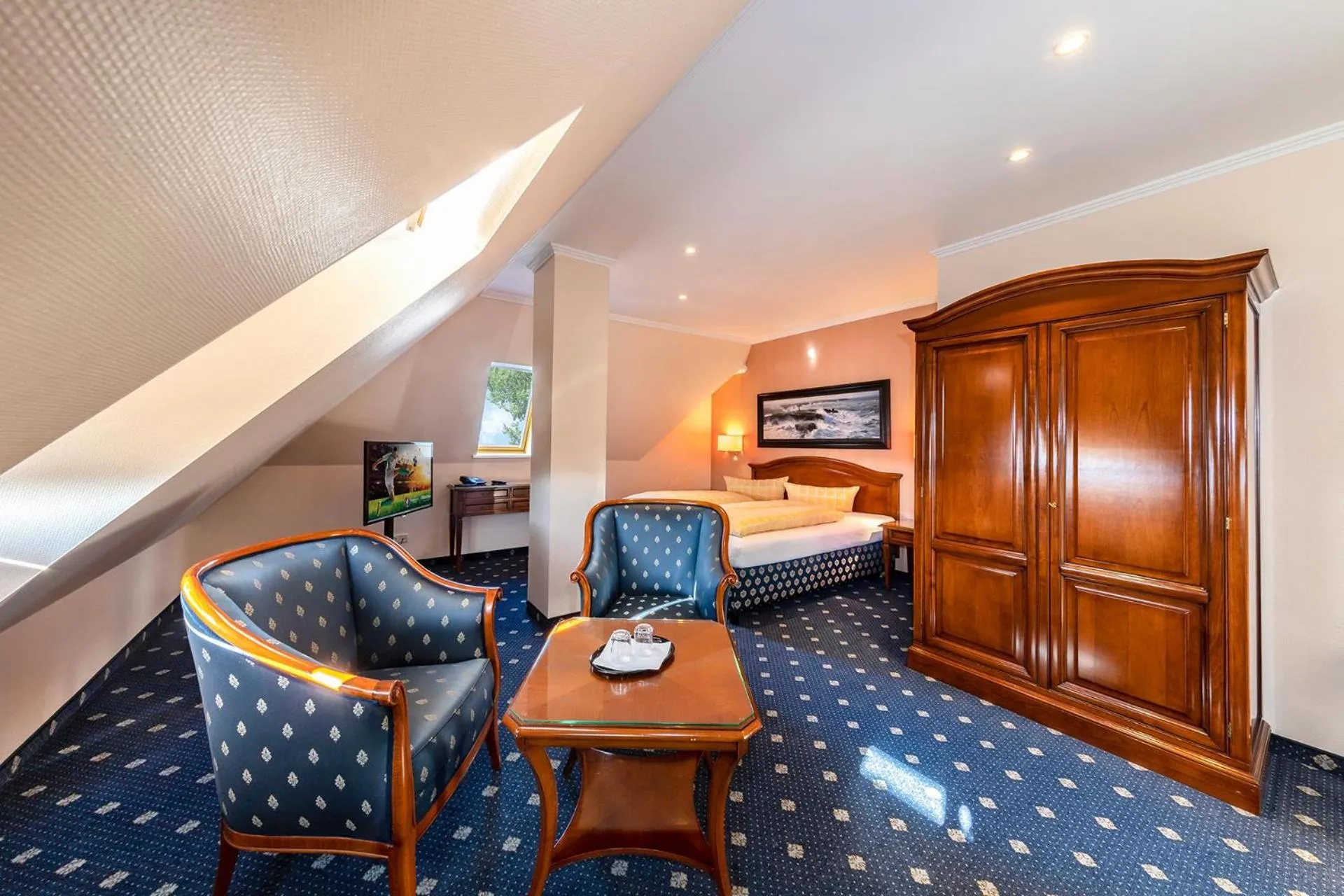 Seating area, Bed in Dünenhotel am Meer