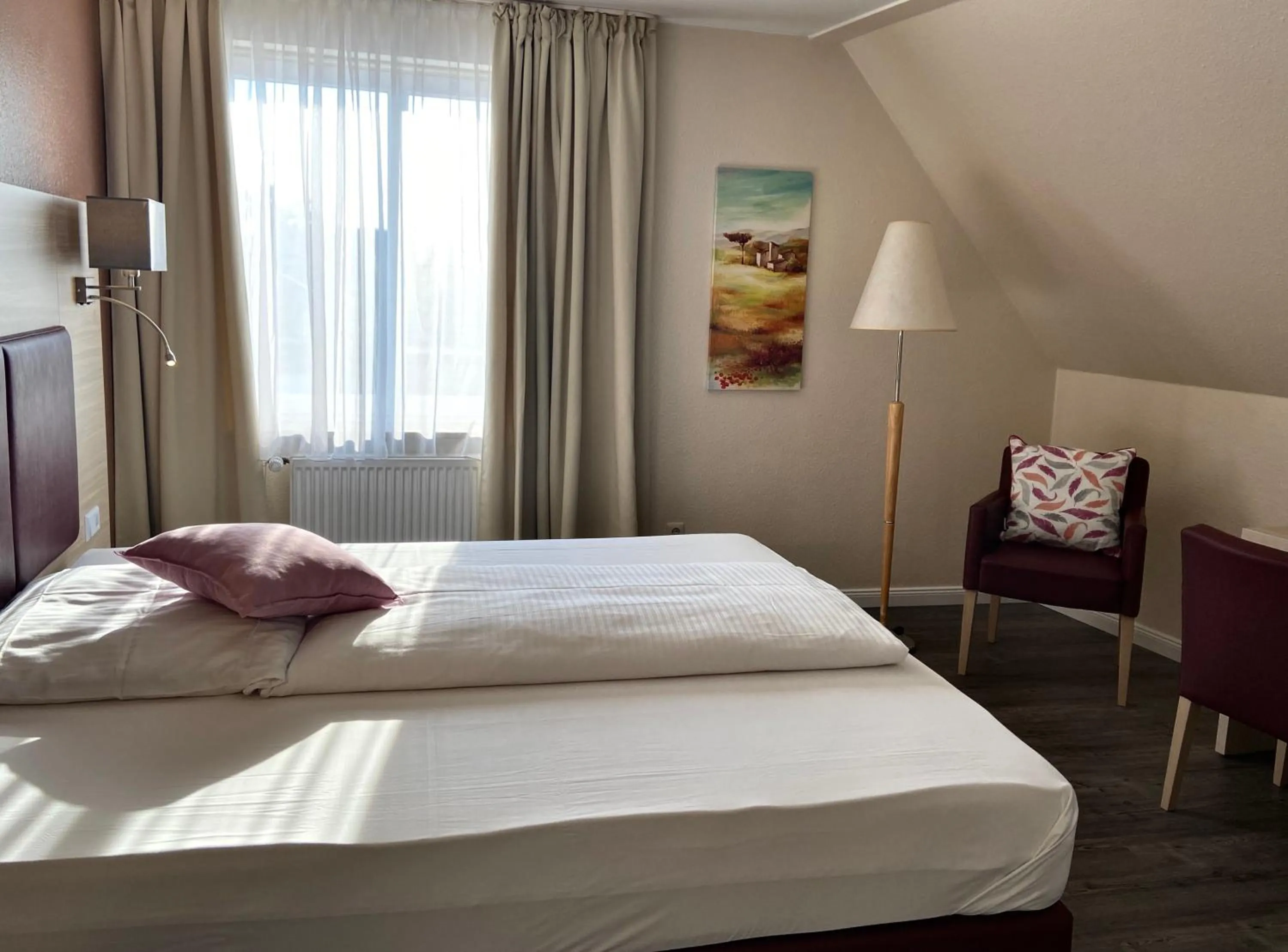 Photo of the whole room, Bed in Residenz Hotel Neu Wulmstorf