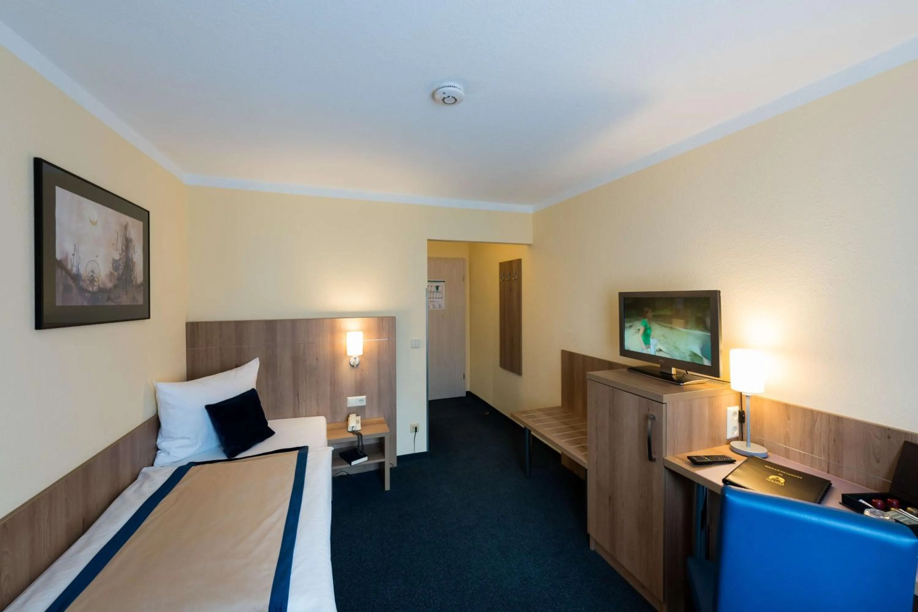 Photo of the whole room, Bed in Askania Hotel & Brauhaus